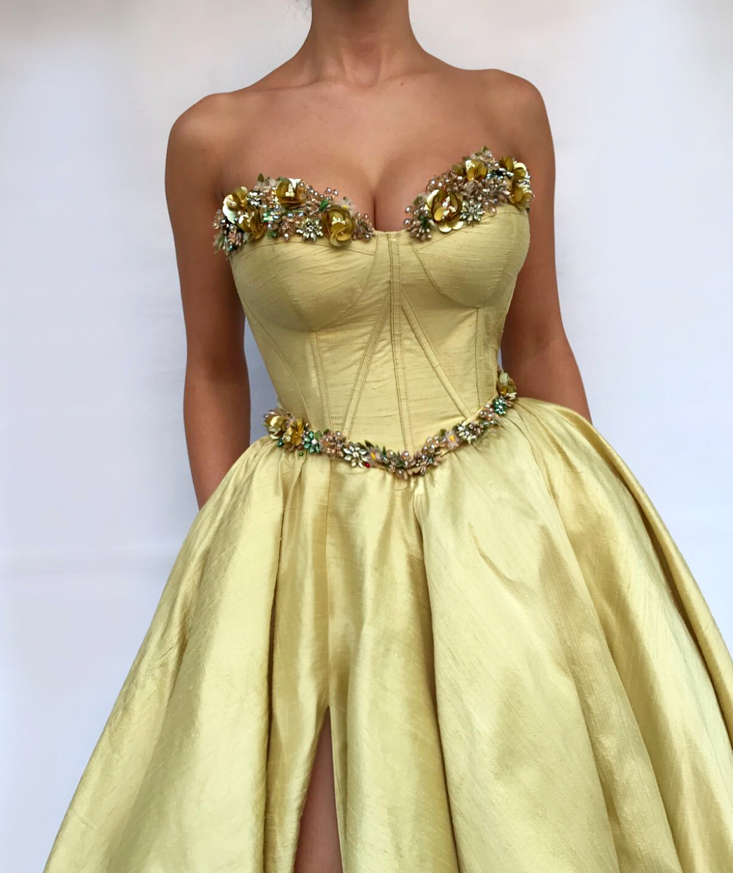 Yellow A-Line dress with no sleeves and embroidery