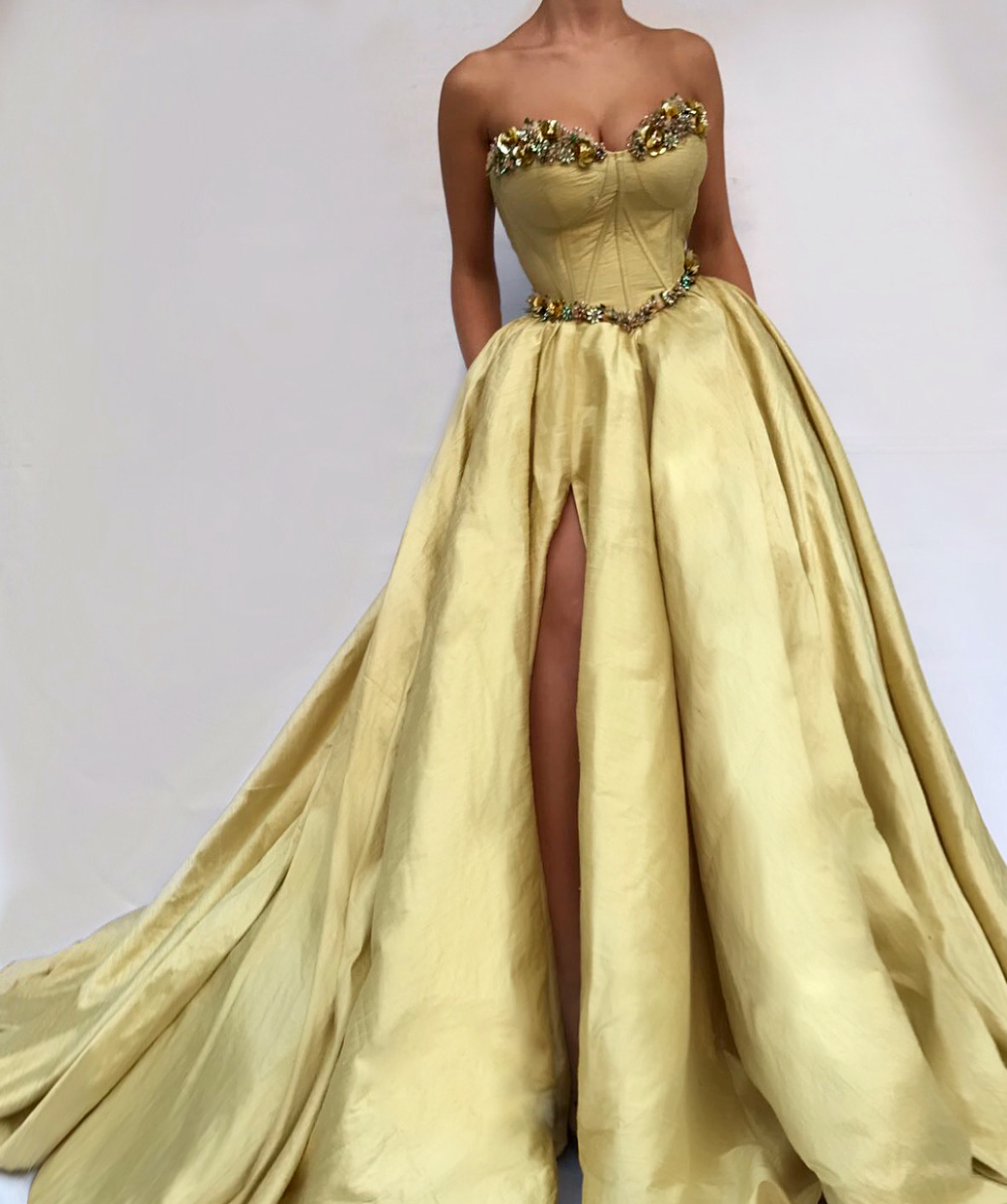 Yellow A-Line dress with no sleeves and embroidery