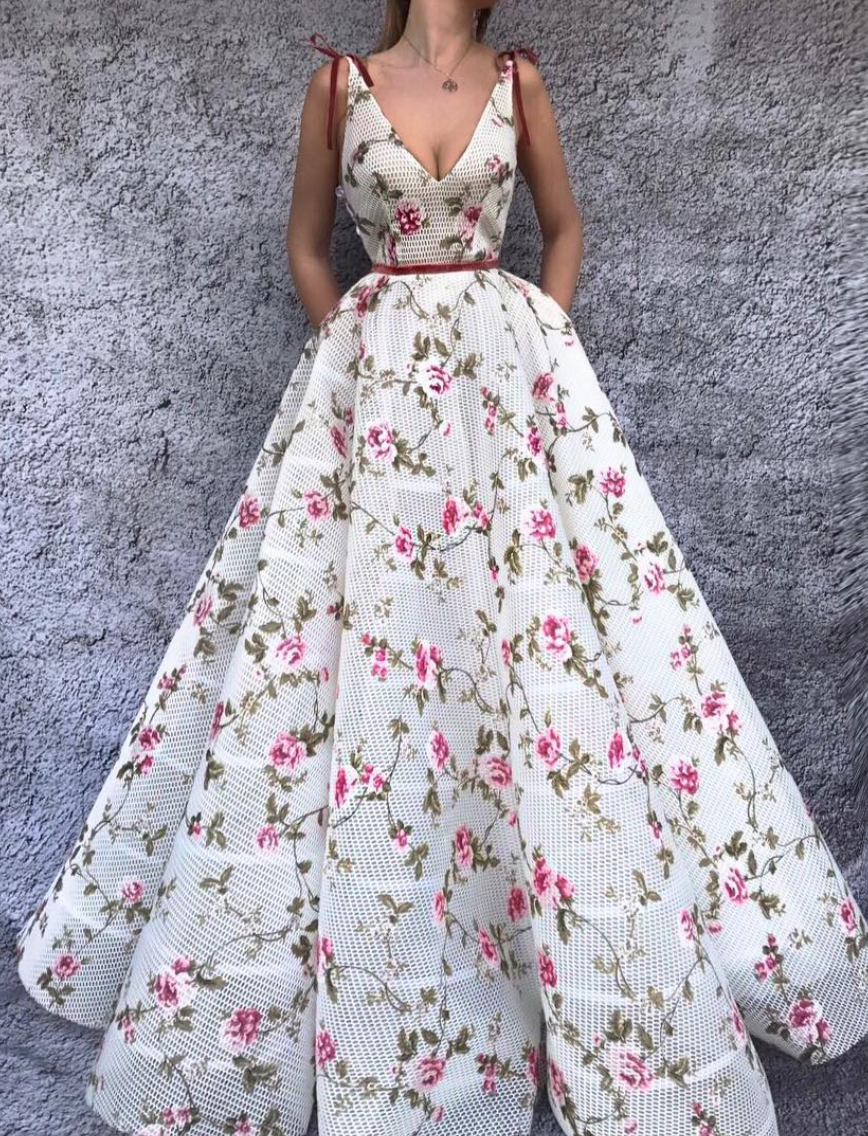 White A-Line dress with v-neck, no sleeves and embroidery