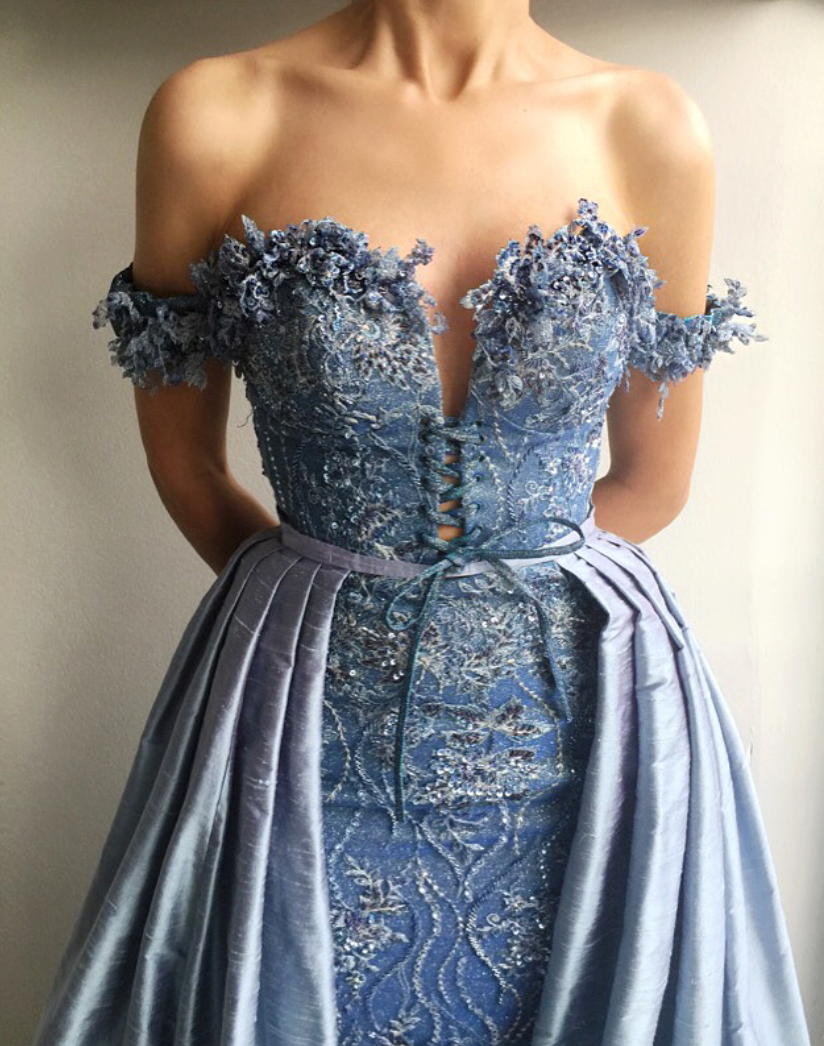 Blue overskirt dress with off the shoulder sleeves and embroidery