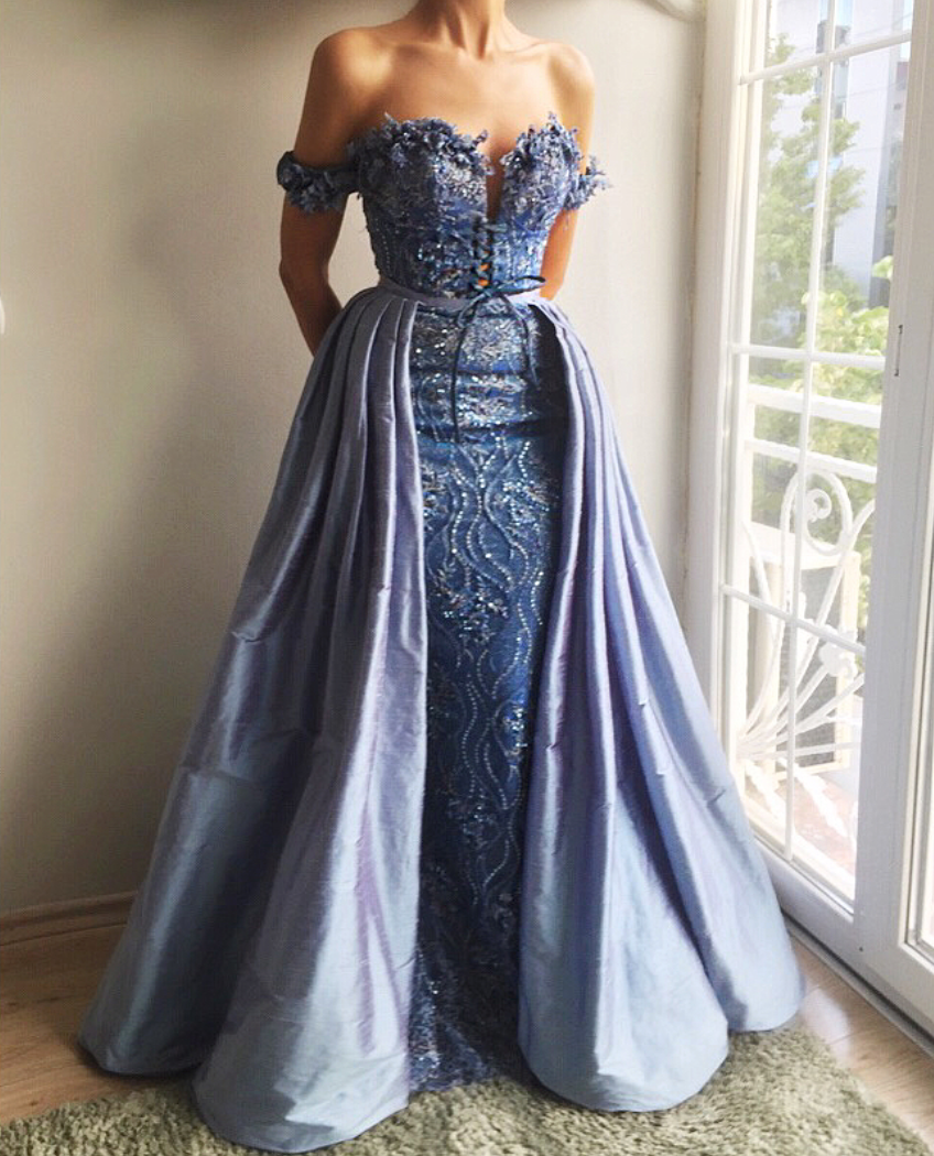 Blue overskirt dress with off the shoulder sleeves and embroidery