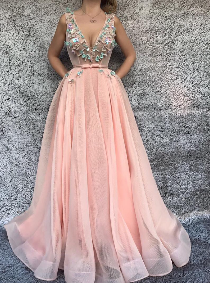 Pink A-Line dress with no sleeves, v-neck and embroidery