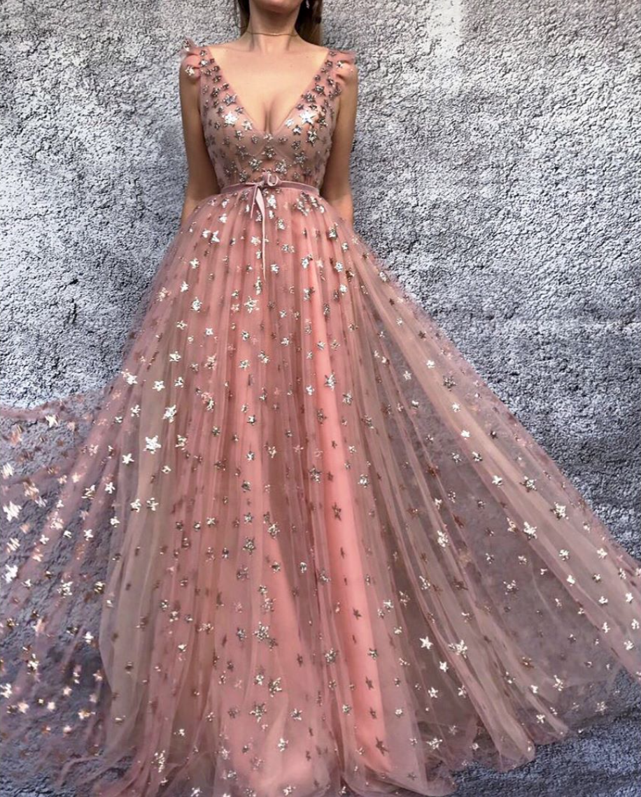 Pink A-Line dress with starry fabric, belt, no sleeves and v-neck