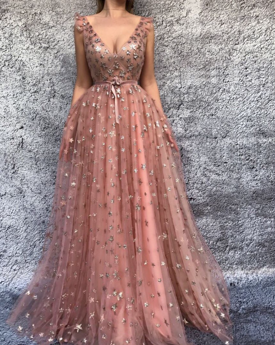 Pink A-Line dress with starry fabric, belt, no sleeves and v-neck