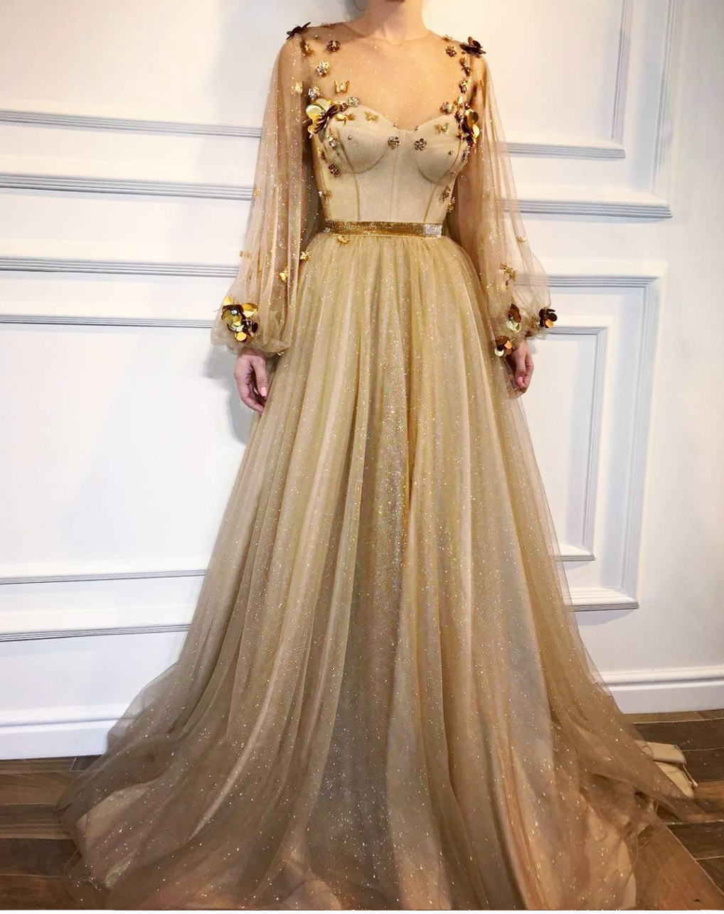 Gold A-Line dress with long sleeves and embroidery