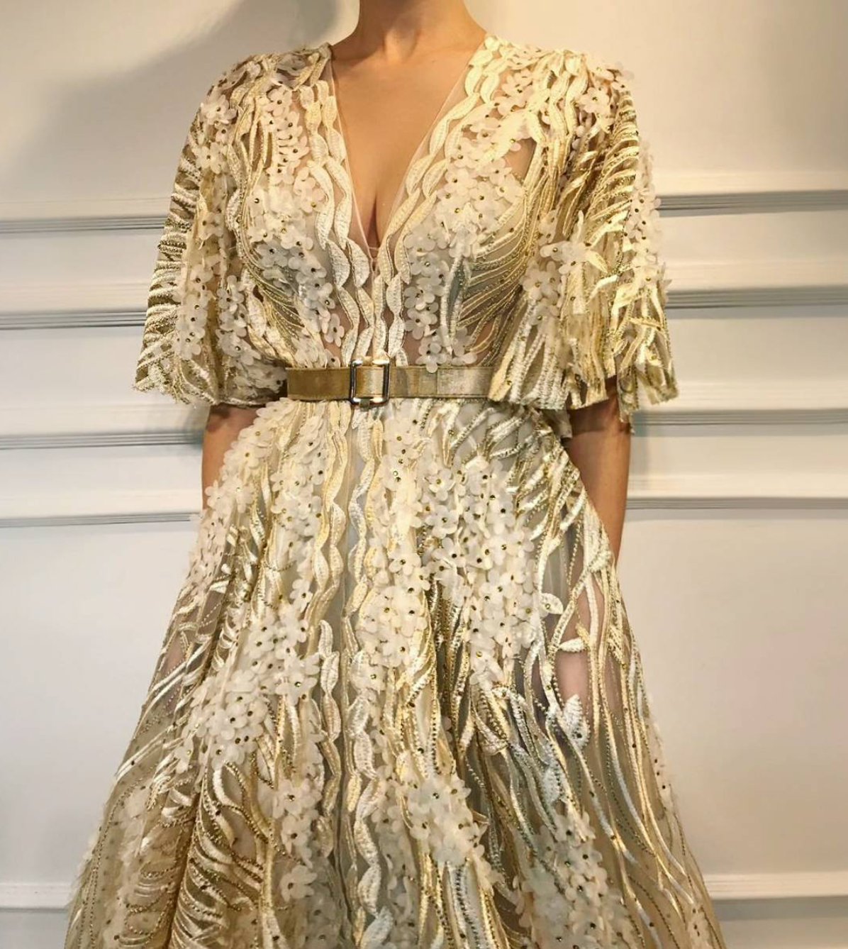 Beige A-Line dress with short sleeves, v-neck and belt