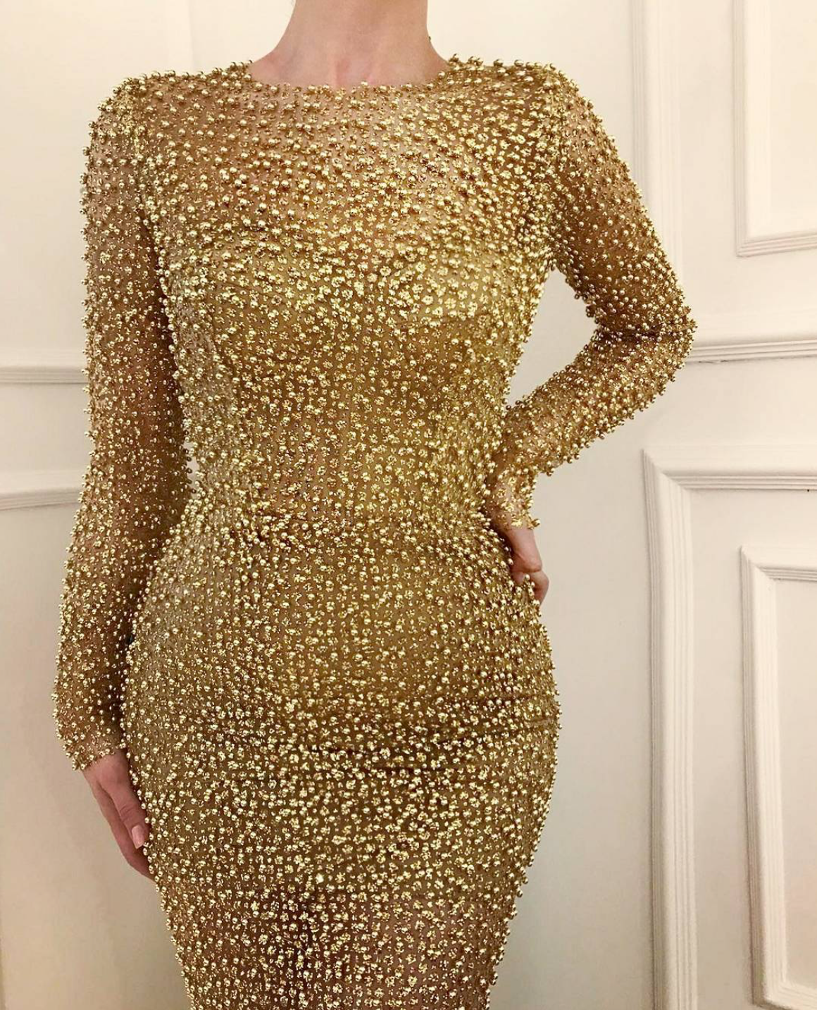 Gold mermaid dress with long sleeves and beading