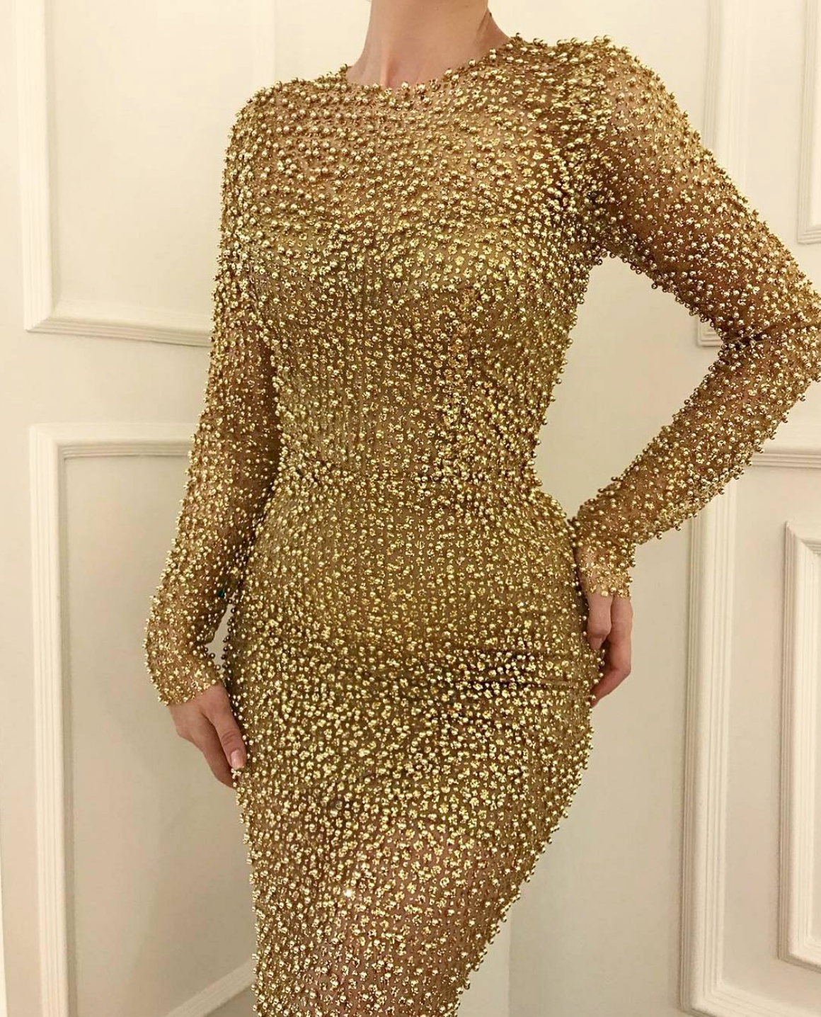 Gold mermaid dress with long sleeves and beading