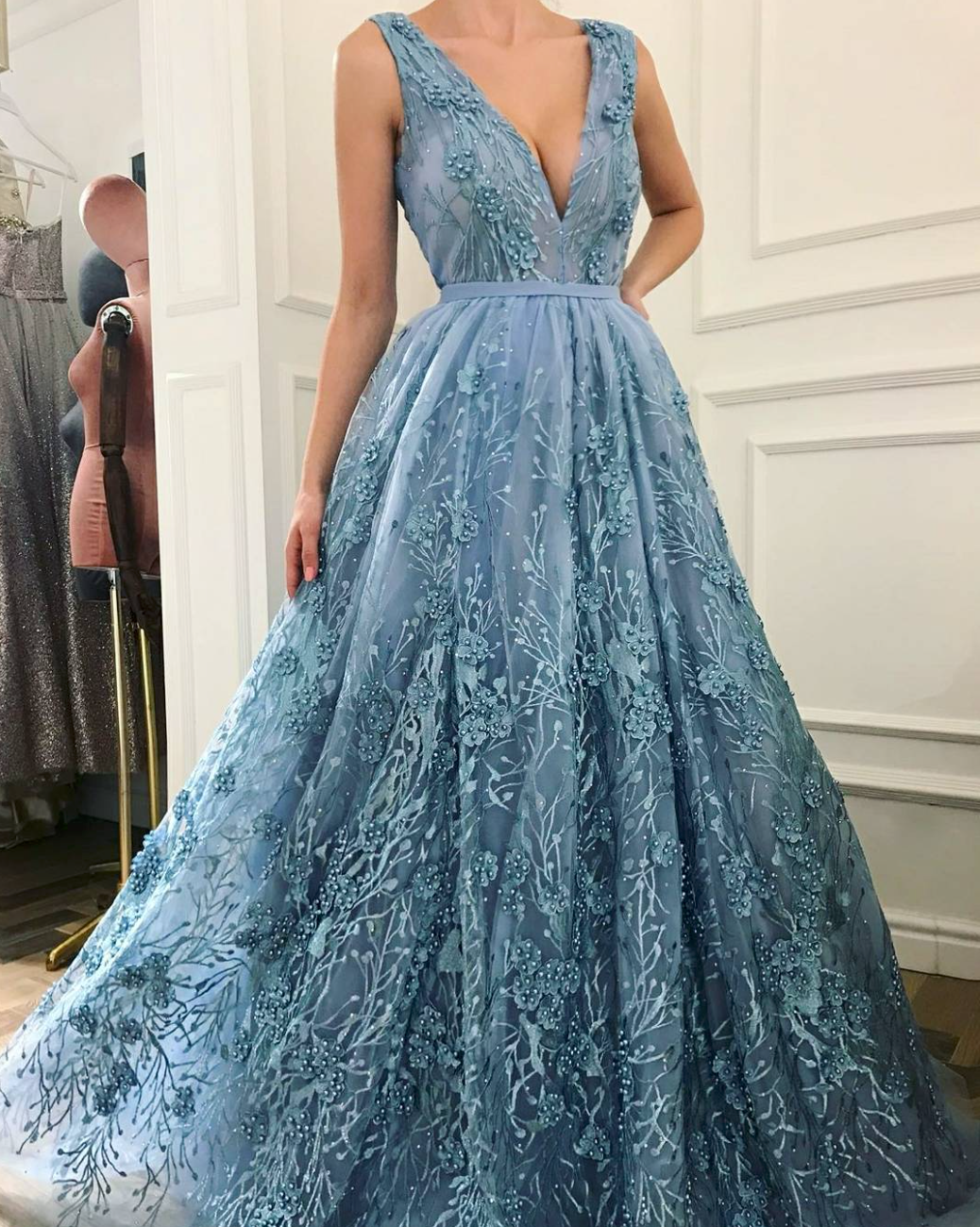 Blue A-Line dress with v-neck, lace and no sleeves
