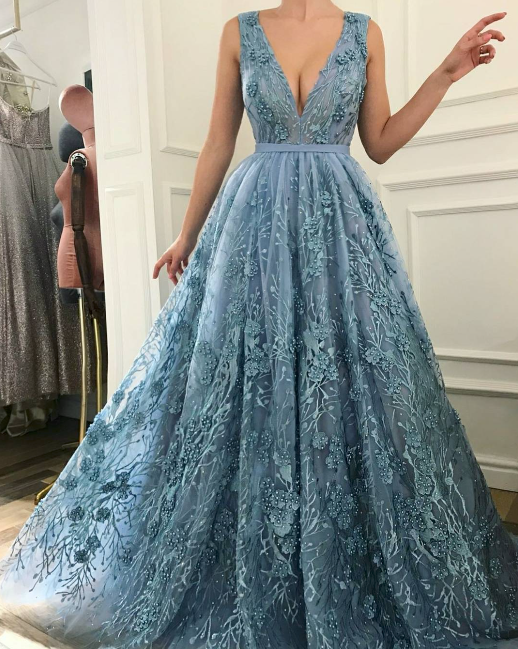 Blue A-Line dress with v-neck, lace and no sleeves