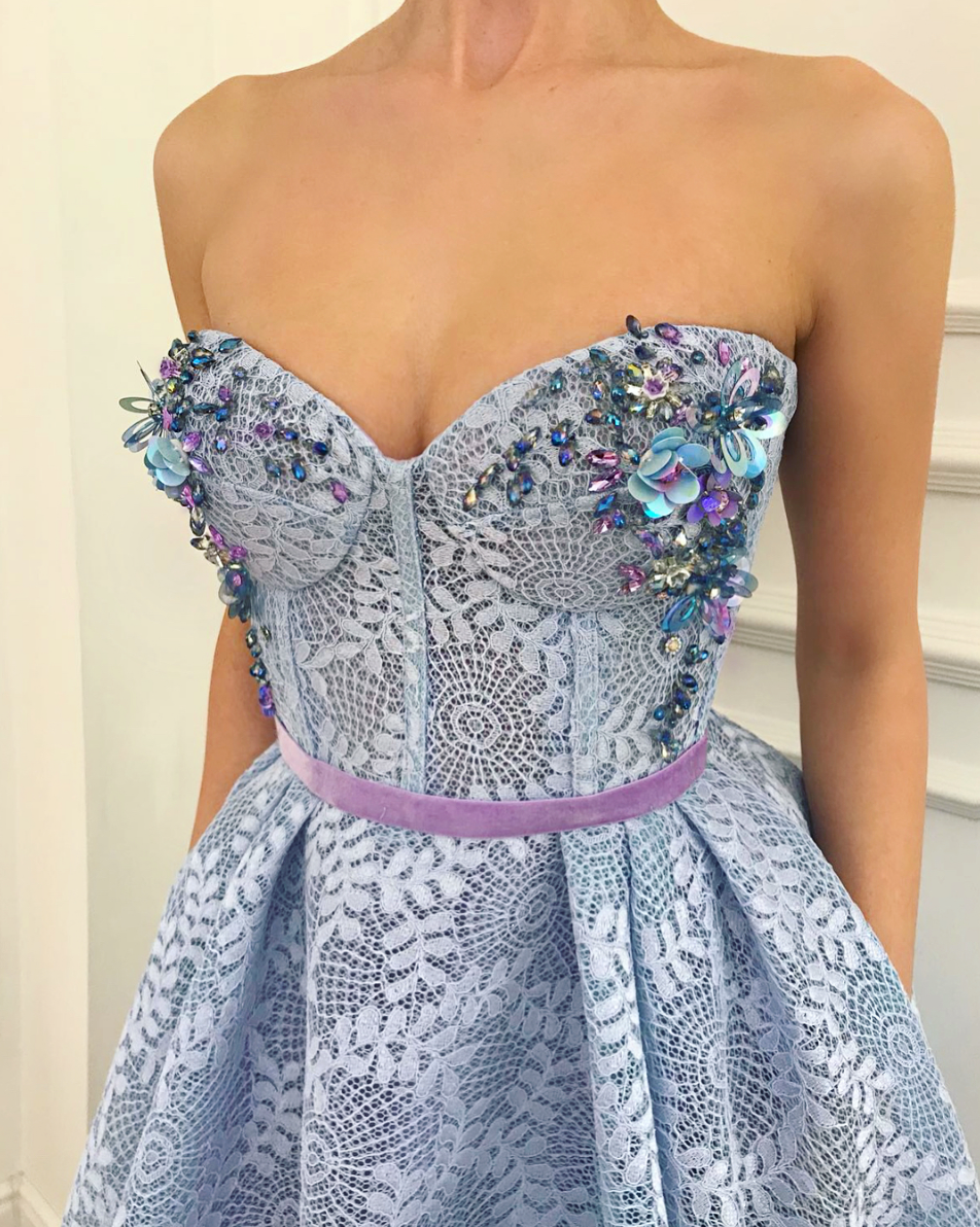 Blue A-Line dress with no sleeves and embroidery