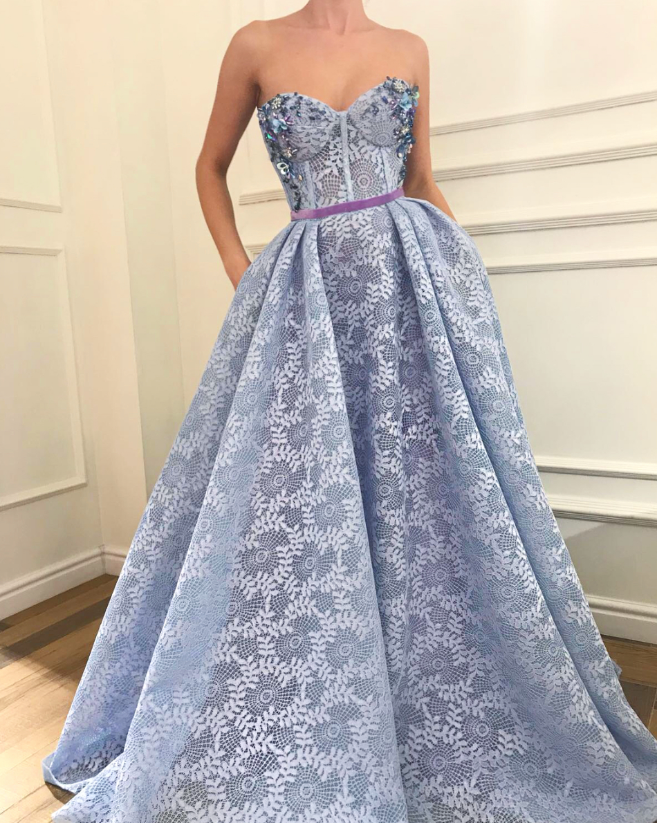 Blue A-Line dress with no sleeves and embroidery