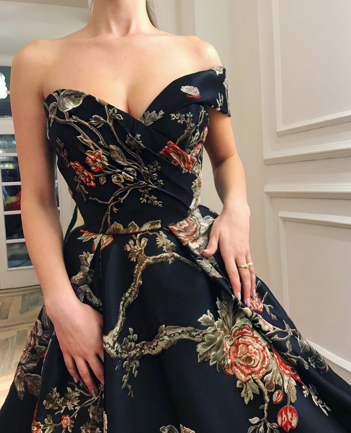 Black A-Line dress with slit, printed flowers and one off the shoulder sleeve