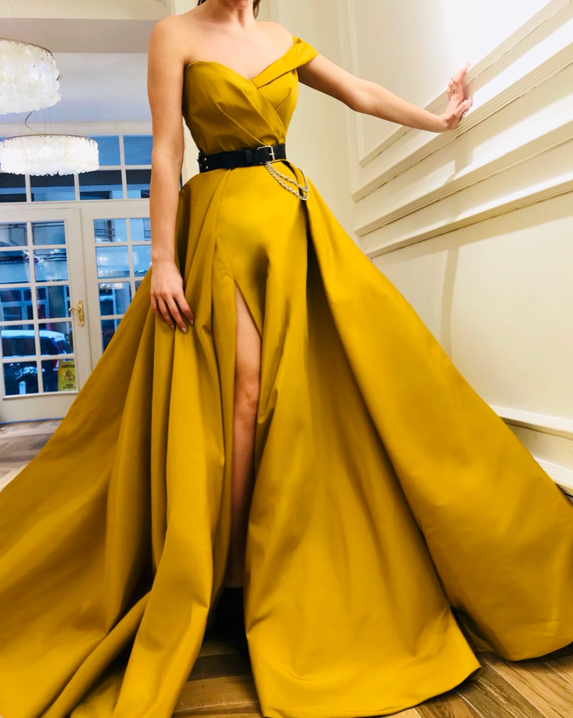 Yellow A-Line dress with one off the shoulder sleeve and belt