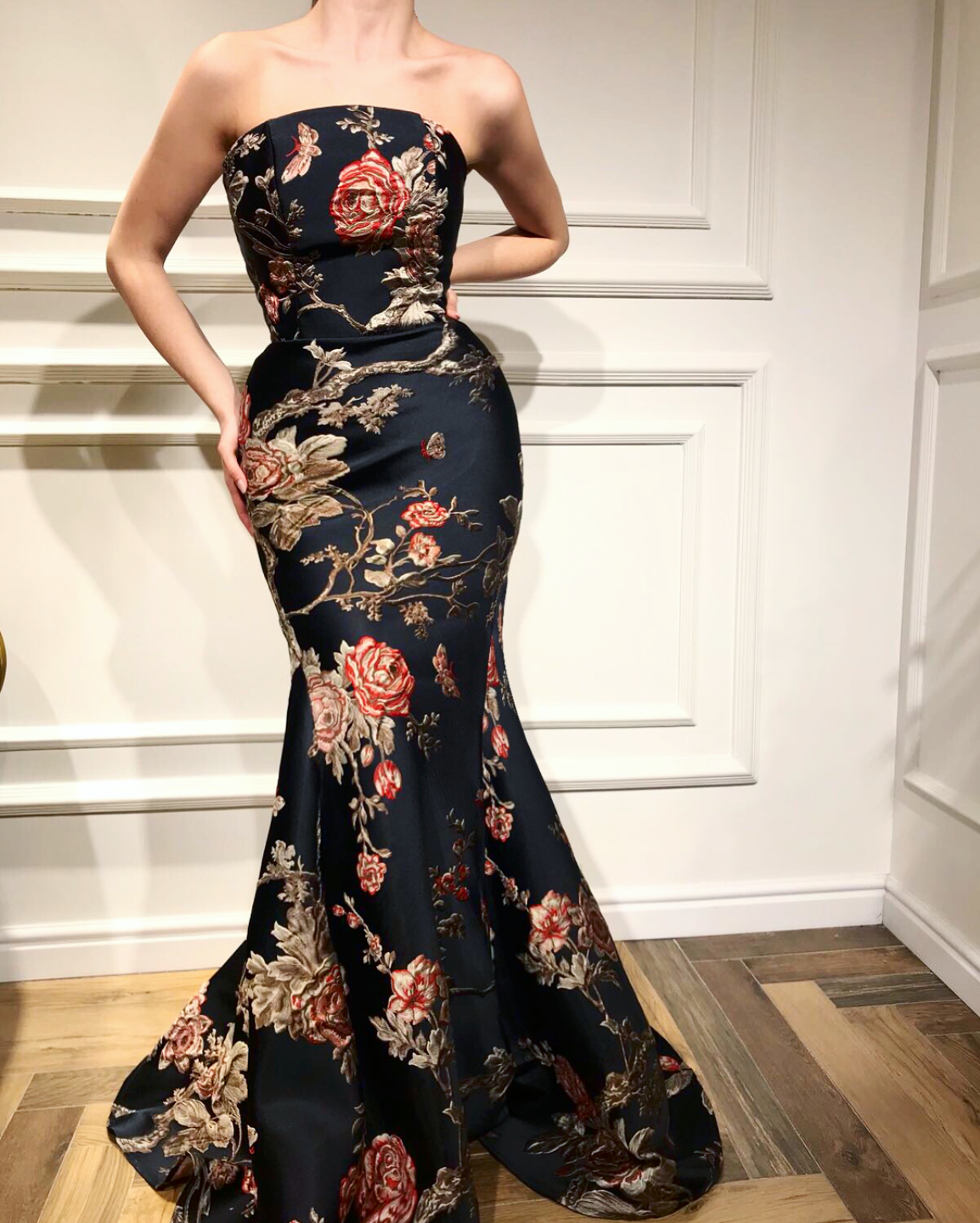 Black mermaid dress with no sleeves and printed flowers
