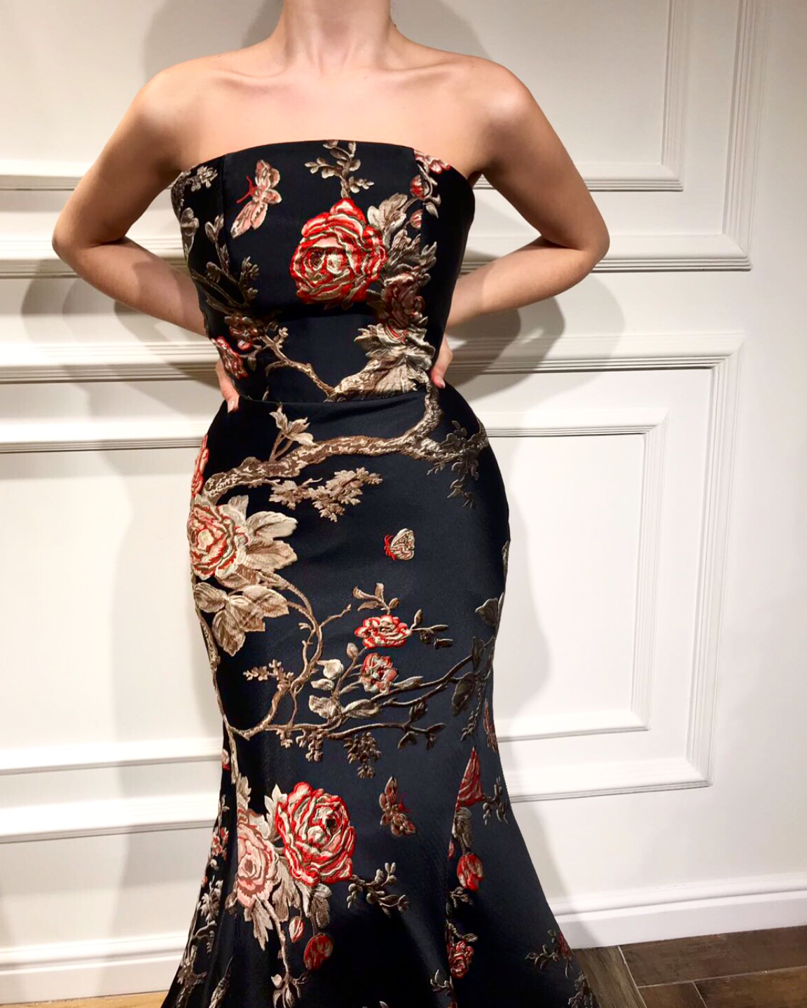 Black mermaid dress with no sleeves and printed flowers