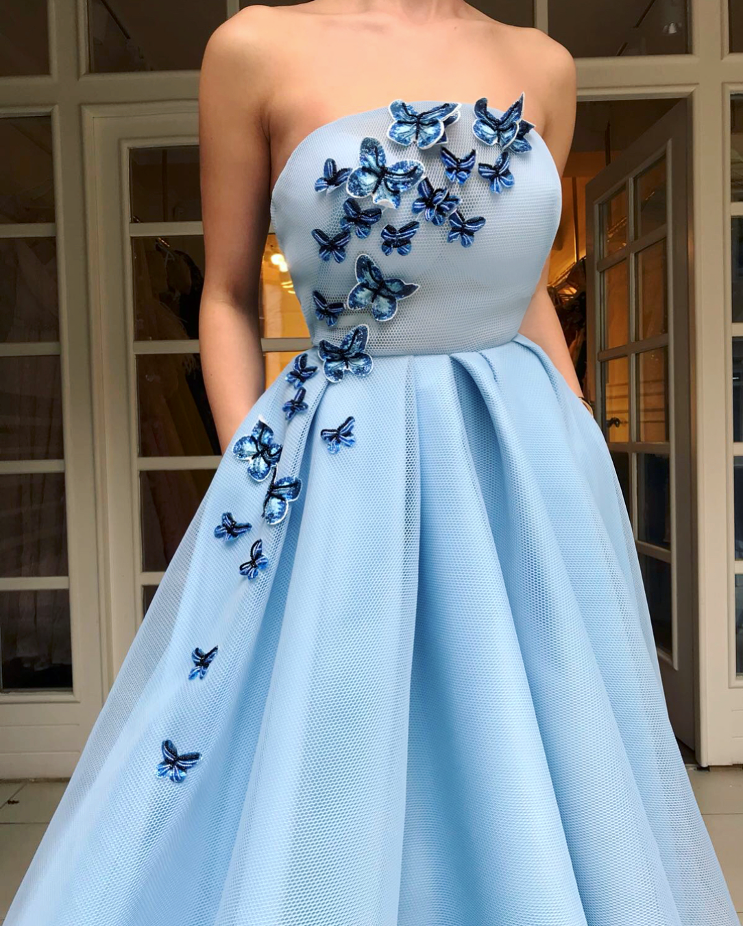 Blue A-Line dress with no sleeves and embroidery