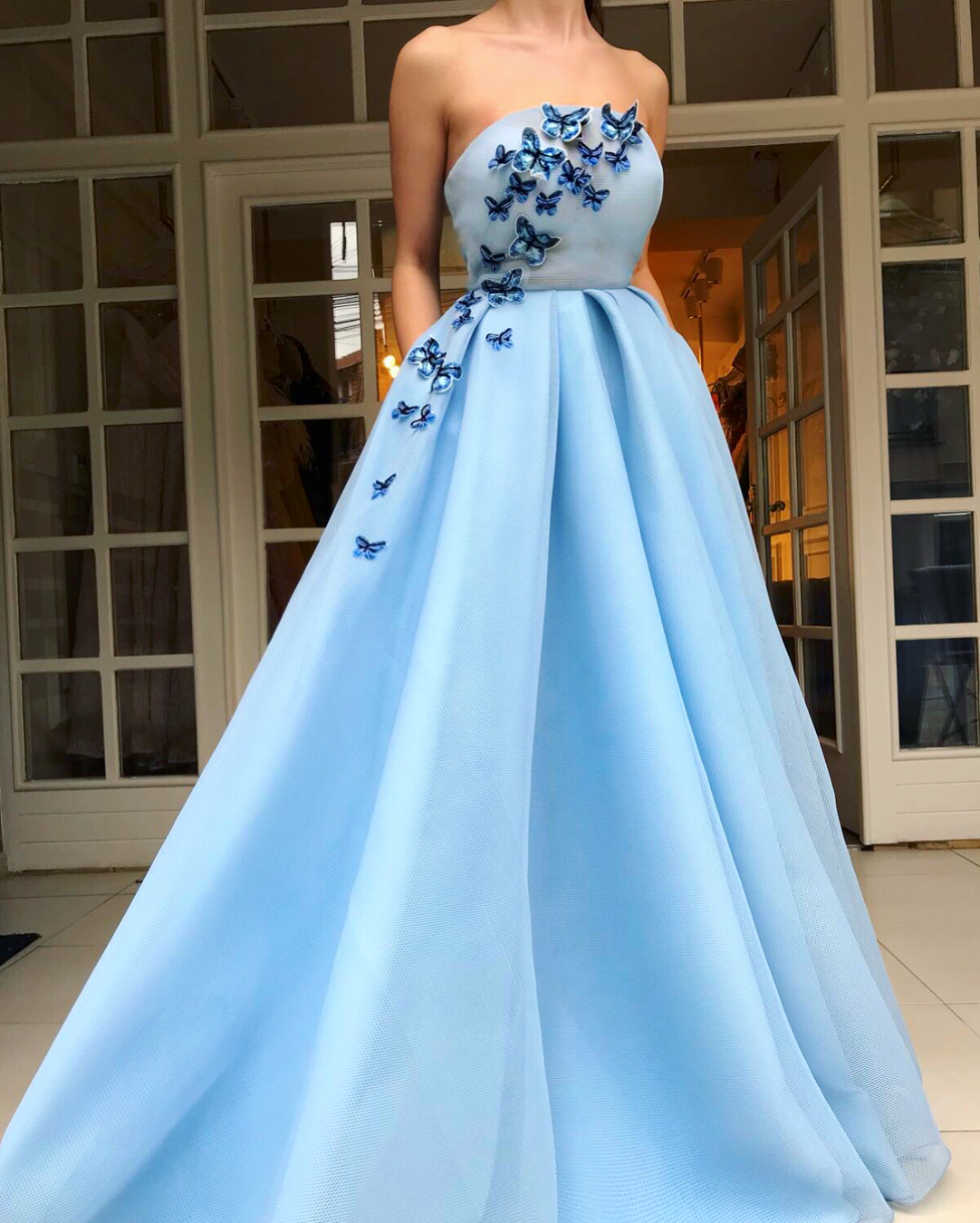Blue A-Line dress with no sleeves and embroidery