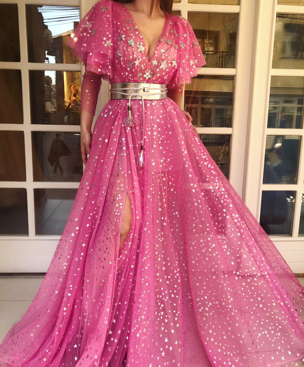 Pink A-Line dress with long sleeves, v-neck, belt and starry fabric