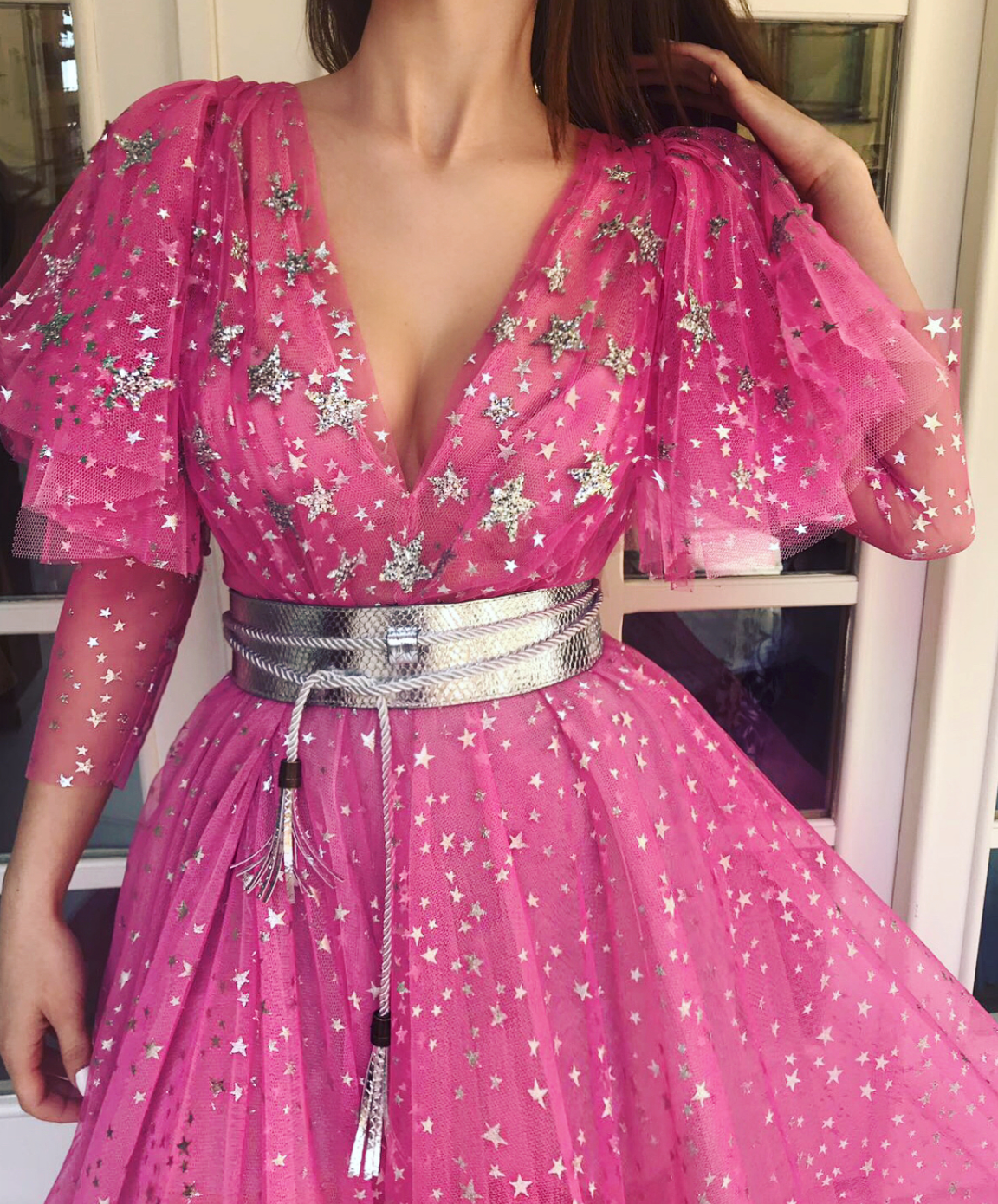Pink A-Line dress with long sleeves, v-neck, belt and starry fabric
