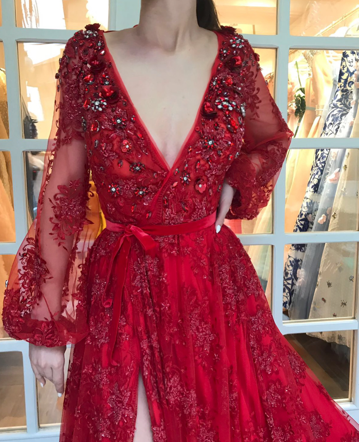 Red A-Line dress with long sleeves, v-neck and embroidery