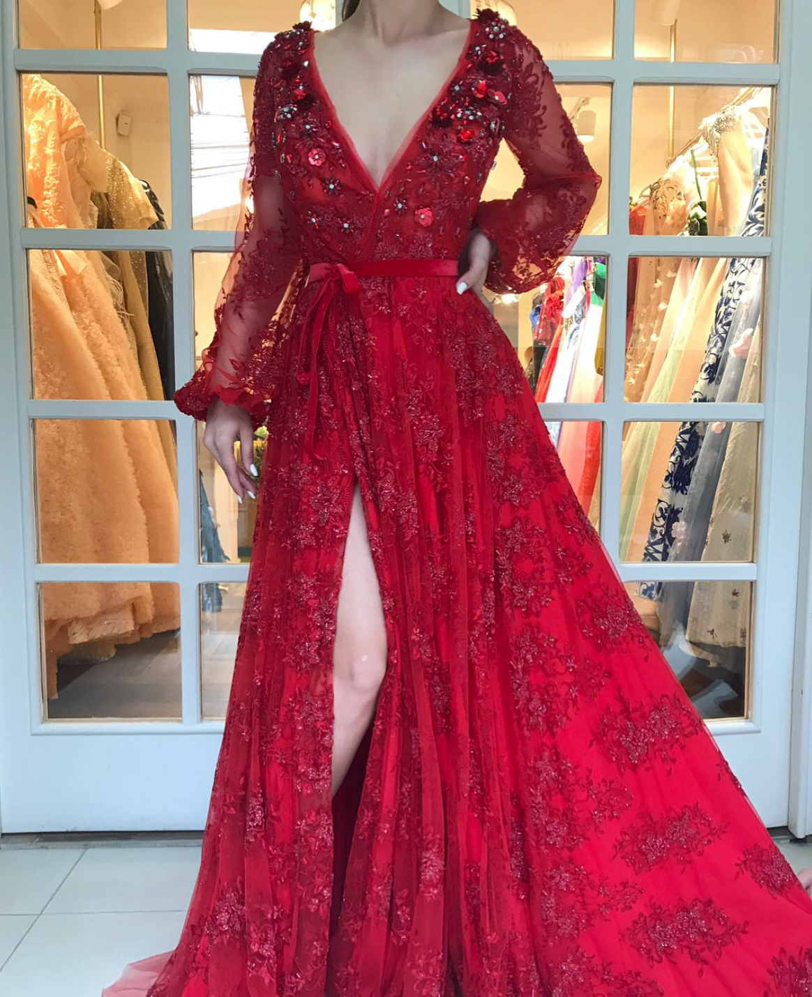 Red A-Line dress with long sleeves, v-neck and embroidery