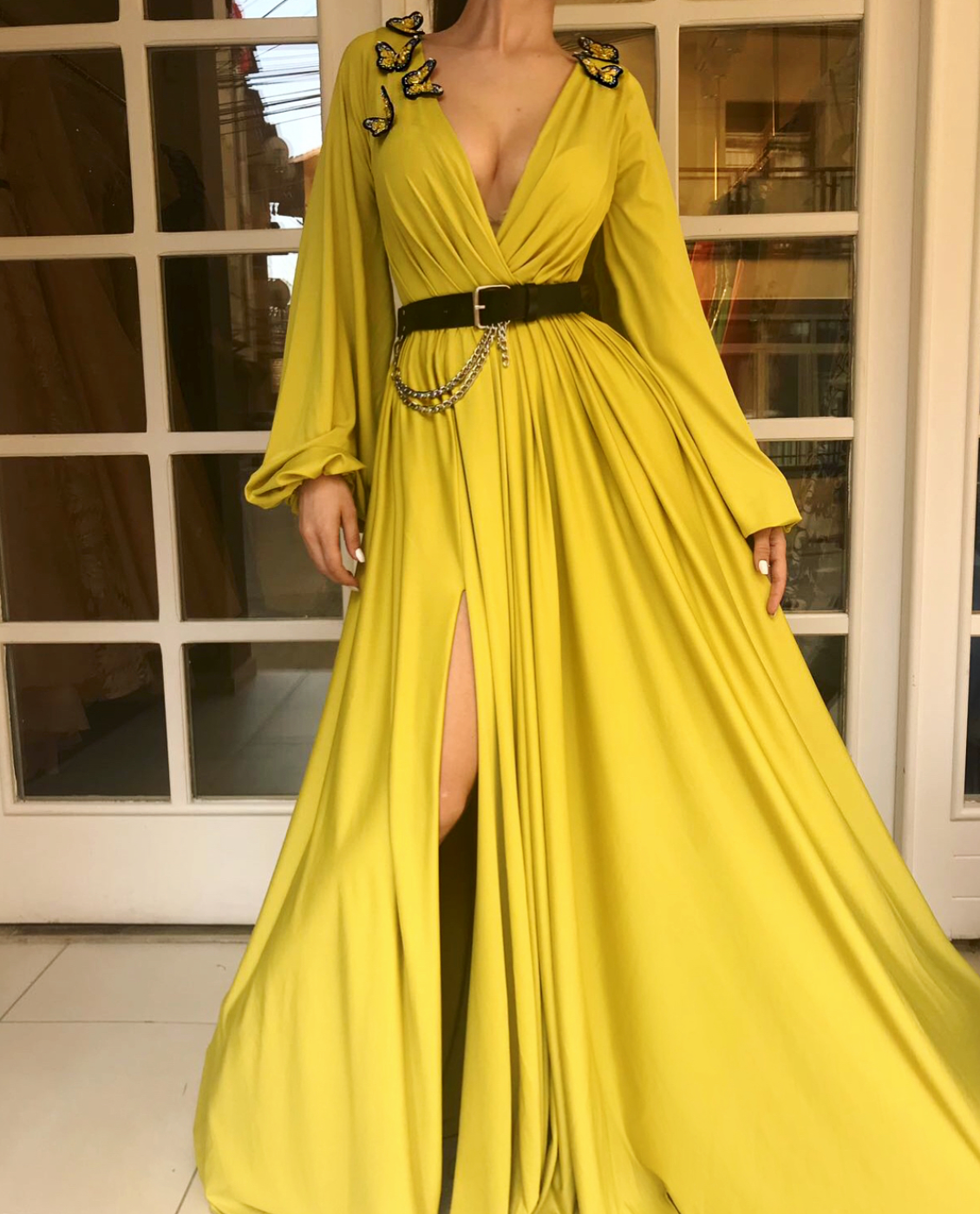Yellow A-Line dress with long sleeves, v-neck, embroidery and belt