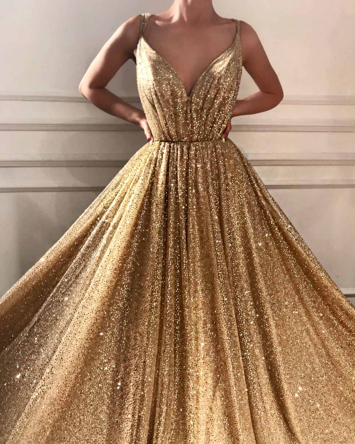 Gold A-Line dress with spaghetti straps, v-neck and sequins