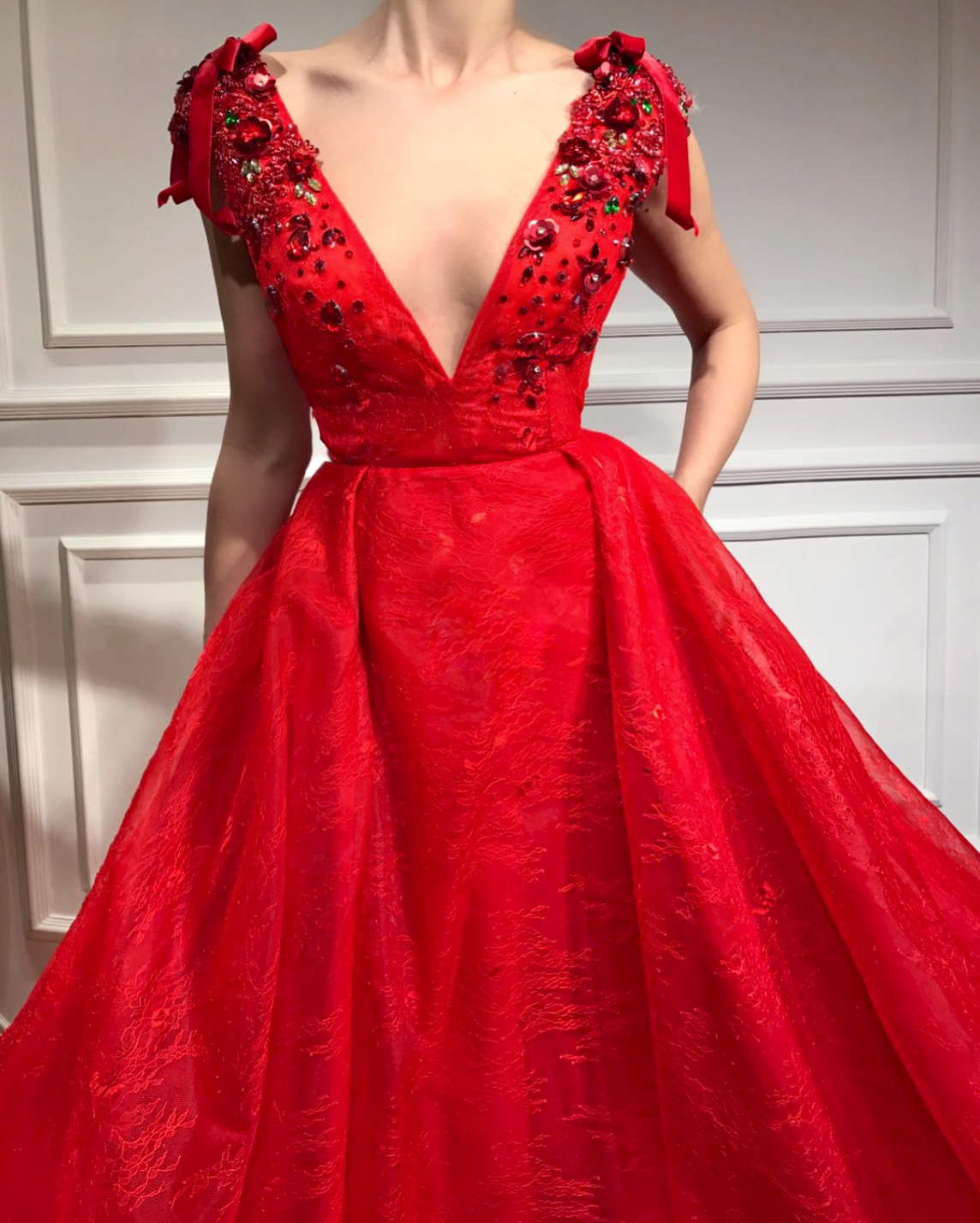 Red A-Line dress with no sleeves, v-neck and embroidery