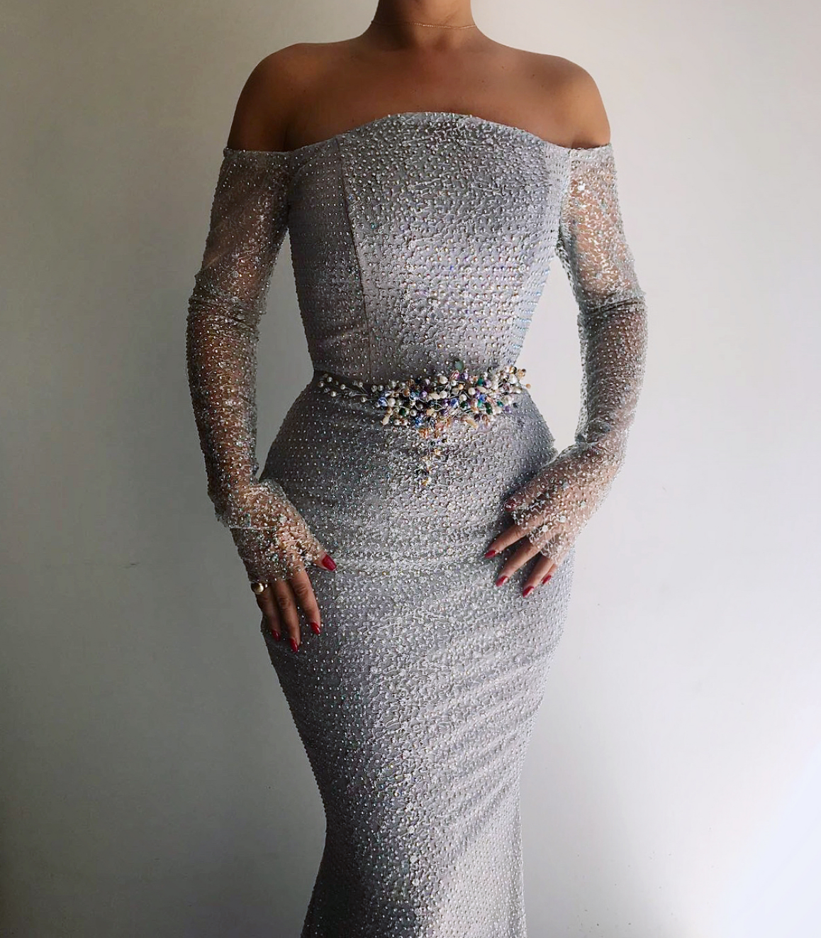 Grey mermaid dress with long off the shoulder sleeves and embroidery