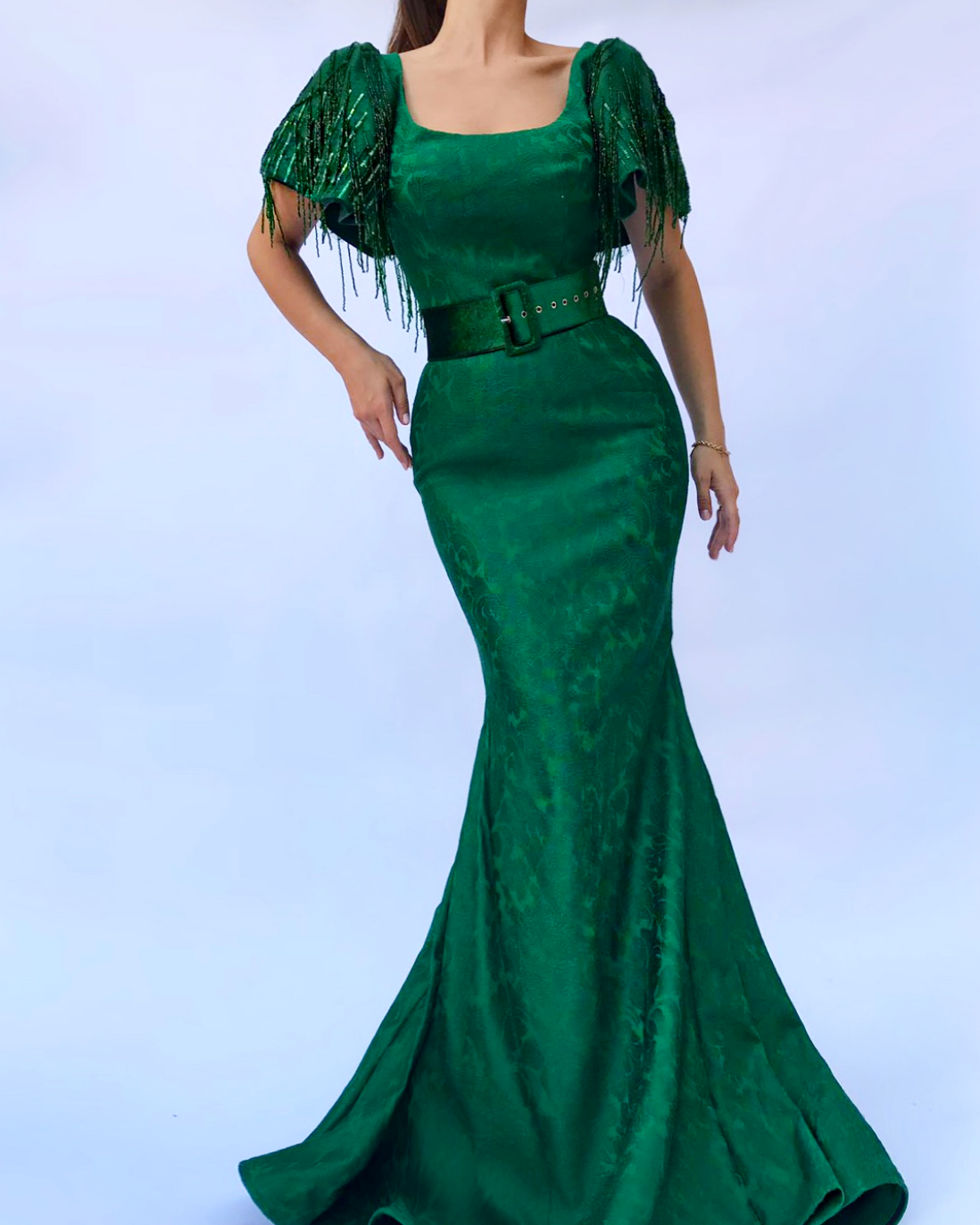 Green mermaid dress with short sleeves and belt