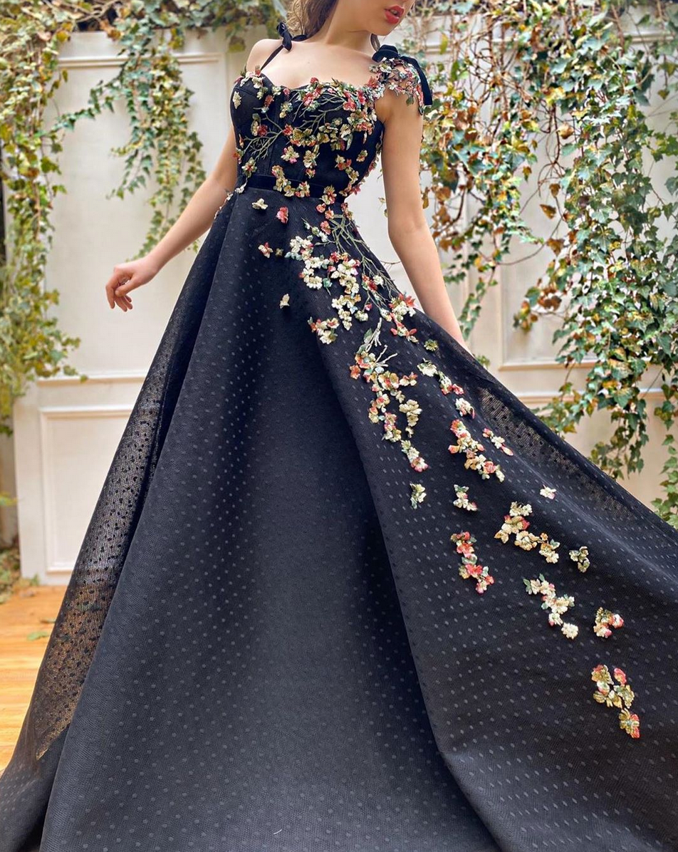 Black A-Line dress with dotted fabric, spaghetti straps and embroidery