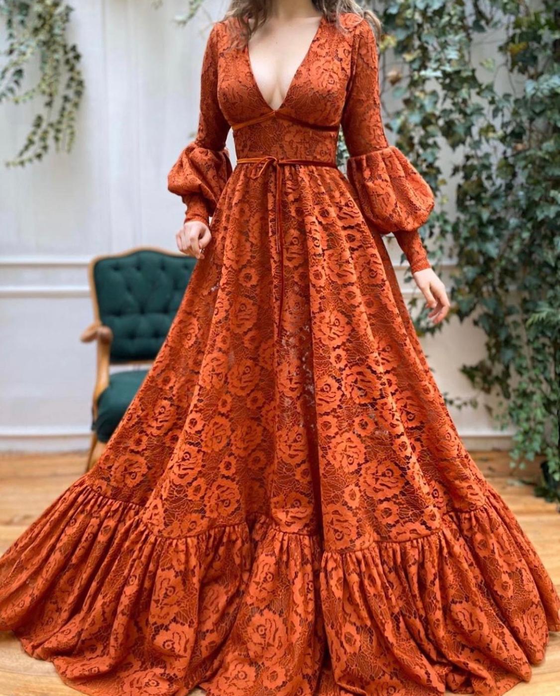Orange A-Line dress with v-neck and long sleeves