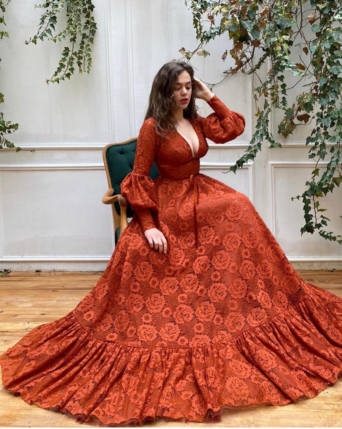 Orange A-Line dress with v-neck and long sleeves