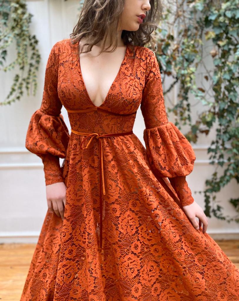 Orange A-Line dress with v-neck and long sleeves