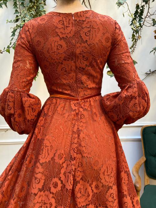 Orange A-Line dress with v-neck and long sleeves