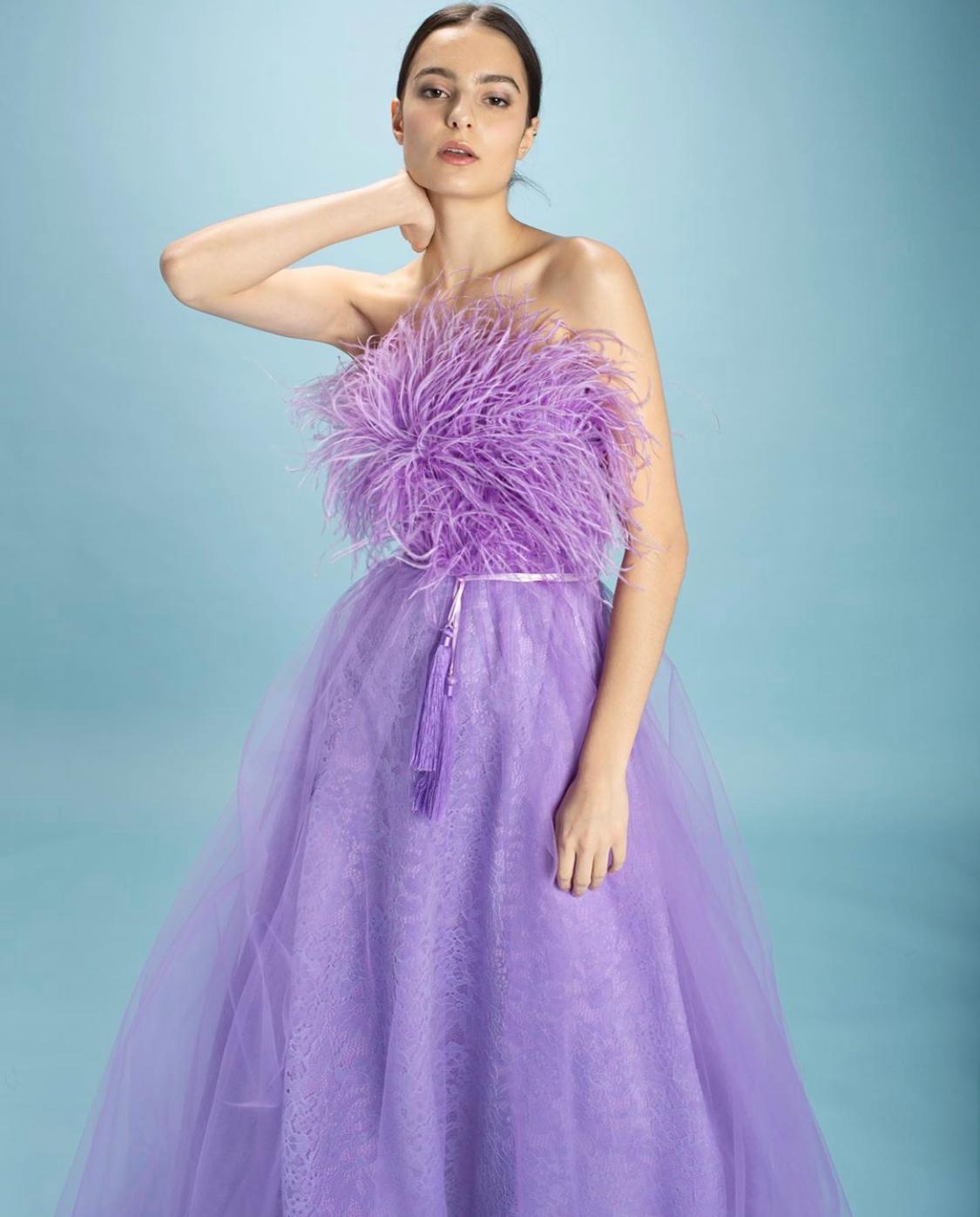 Purple A-Line dress wit no sleeves and feathers