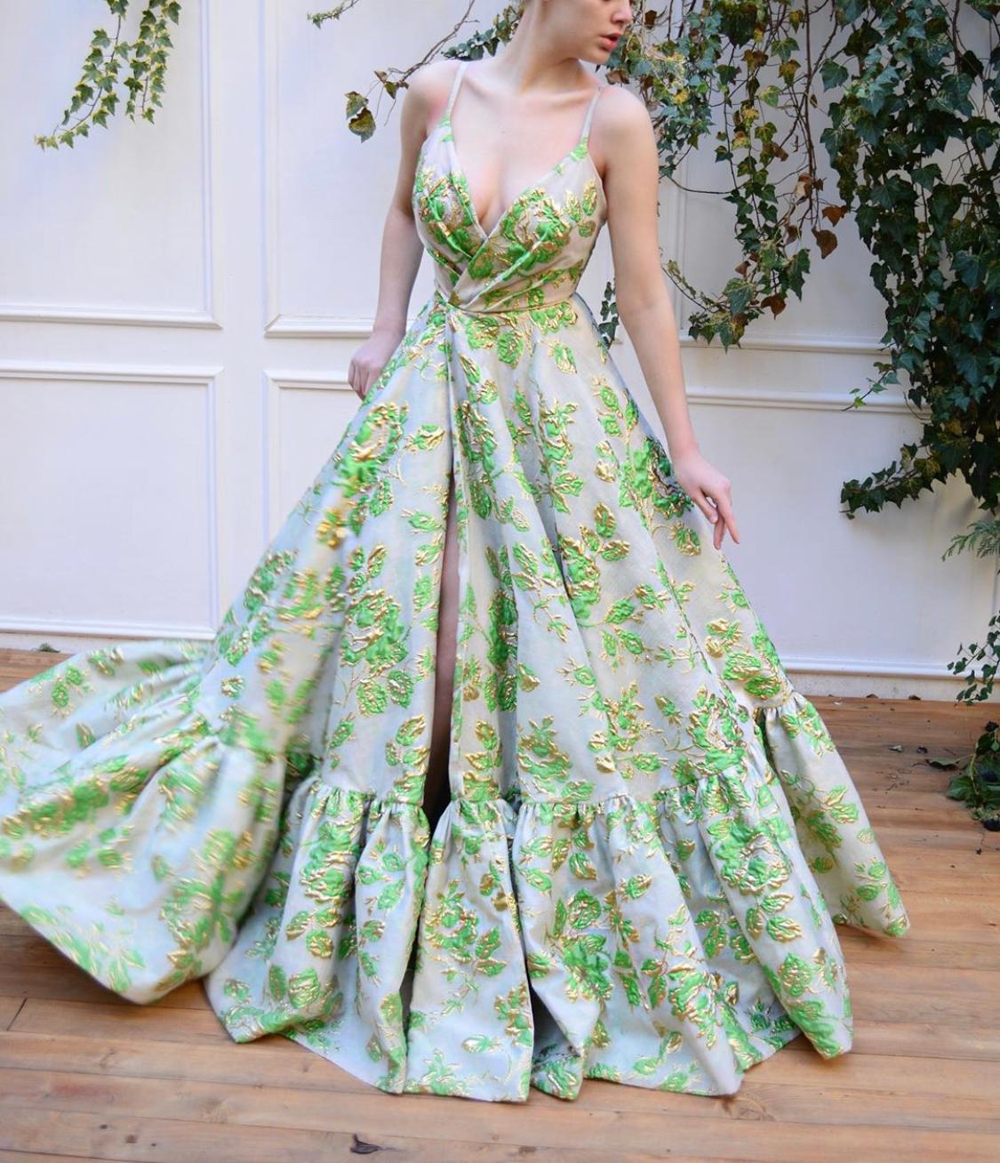 Green A-Line dress with printed flowers, v-neck and spaghetti straps