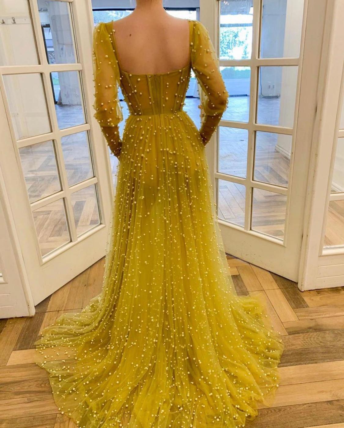 Yellow A-Line dress with long sleeves and beading