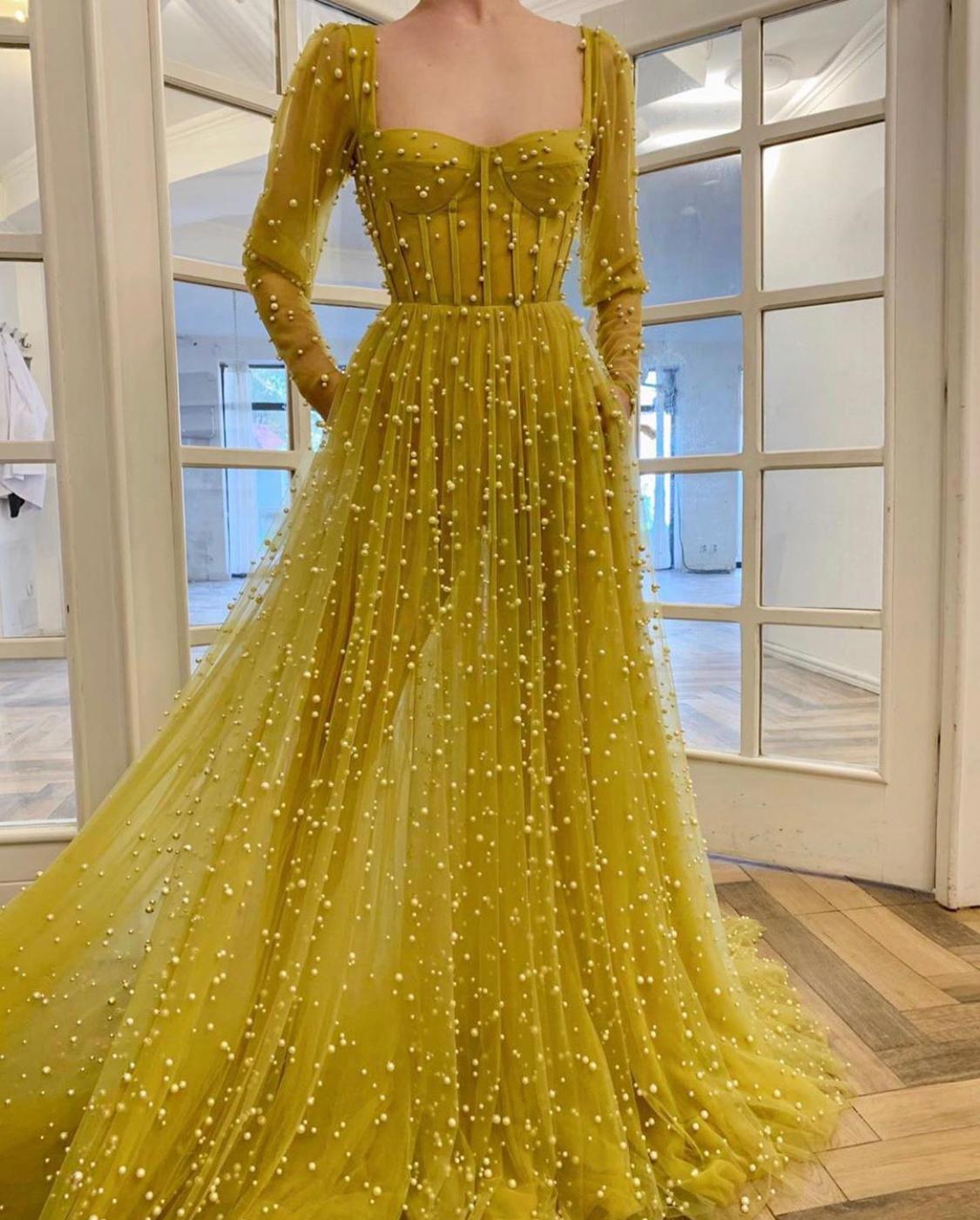 Yellow A-Line dress with long sleeves and beading