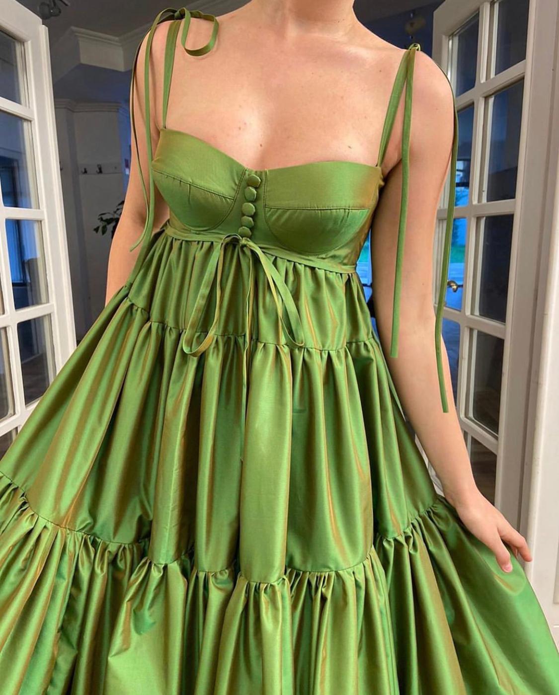 Green sheath dress with spaghetti straps