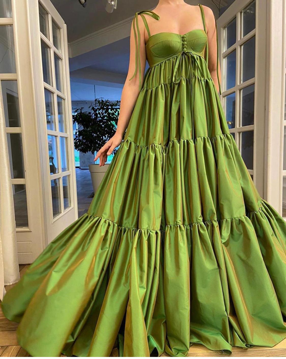 Green sheath dress with spaghetti straps