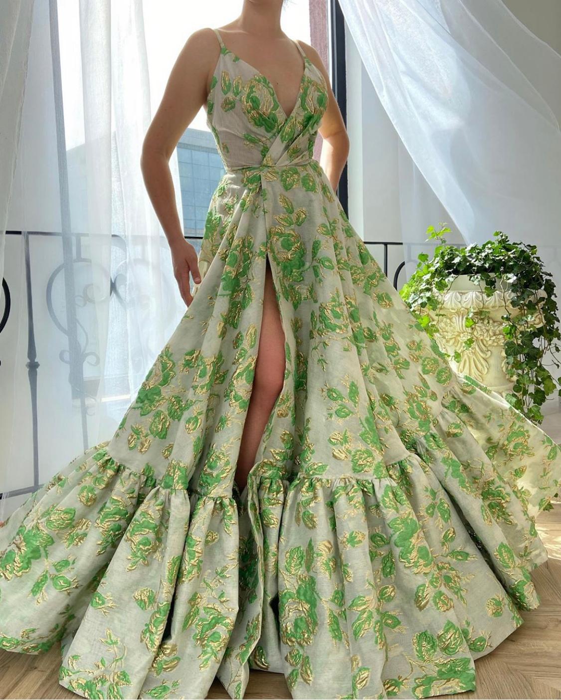Green A-Line dress with printed flowers, v-neck and spaghetti straps