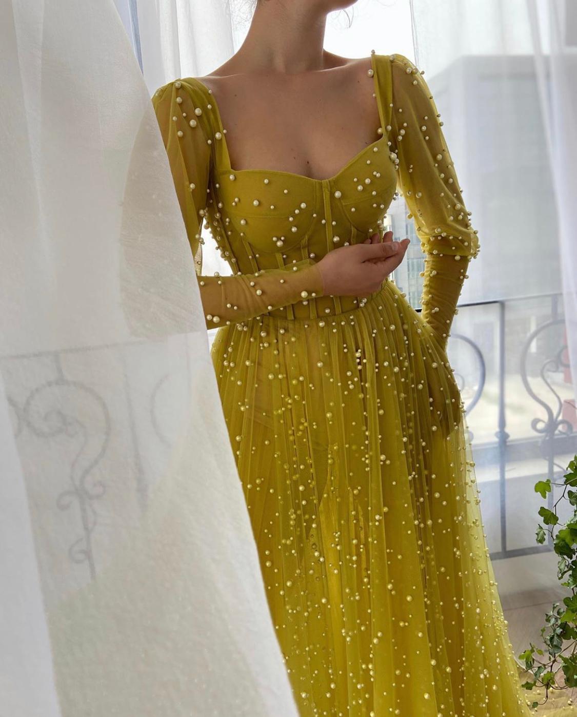 Yellow A-Line dress with long sleeves and beading
