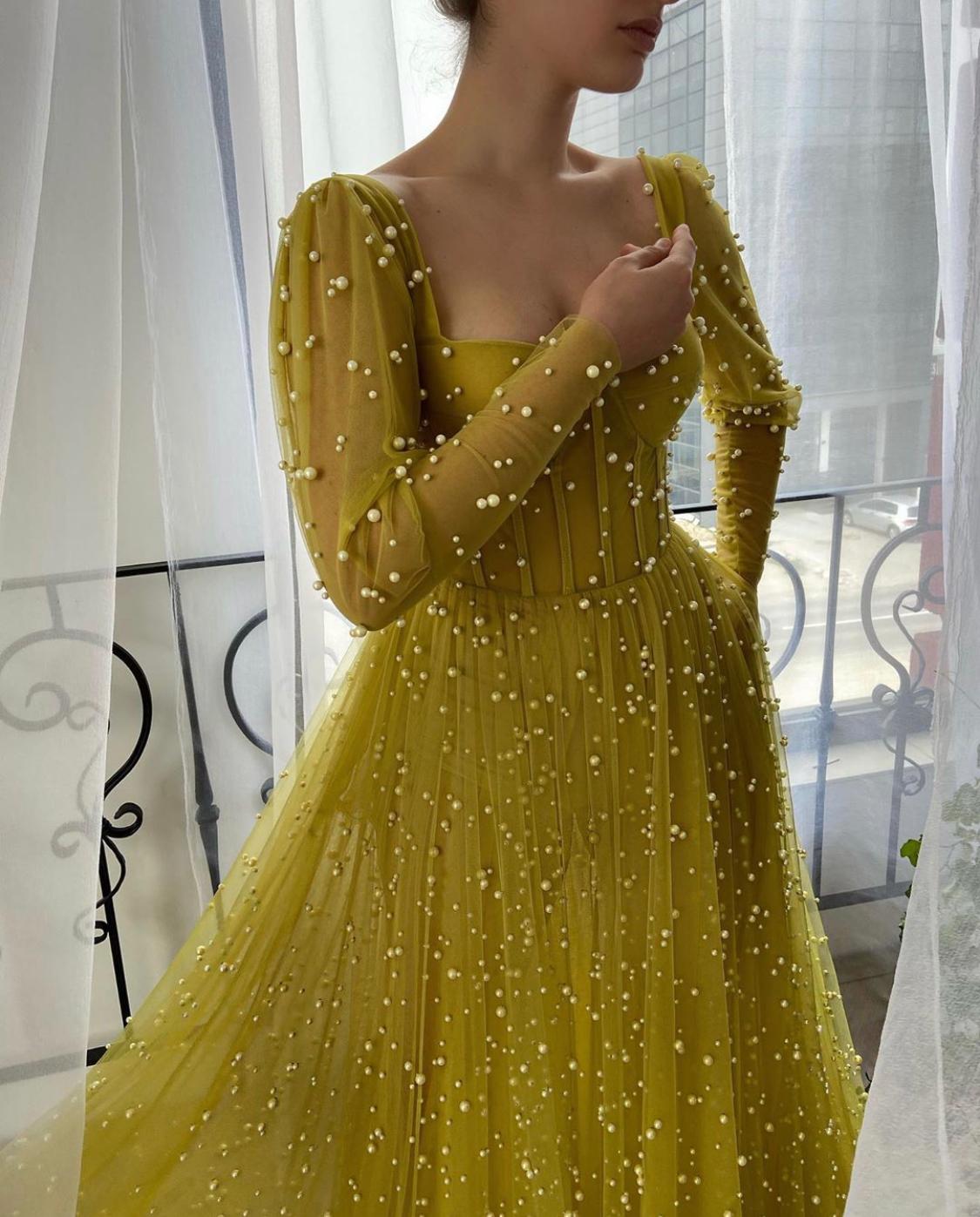 Yellow A-Line dress with long sleeves and beading
