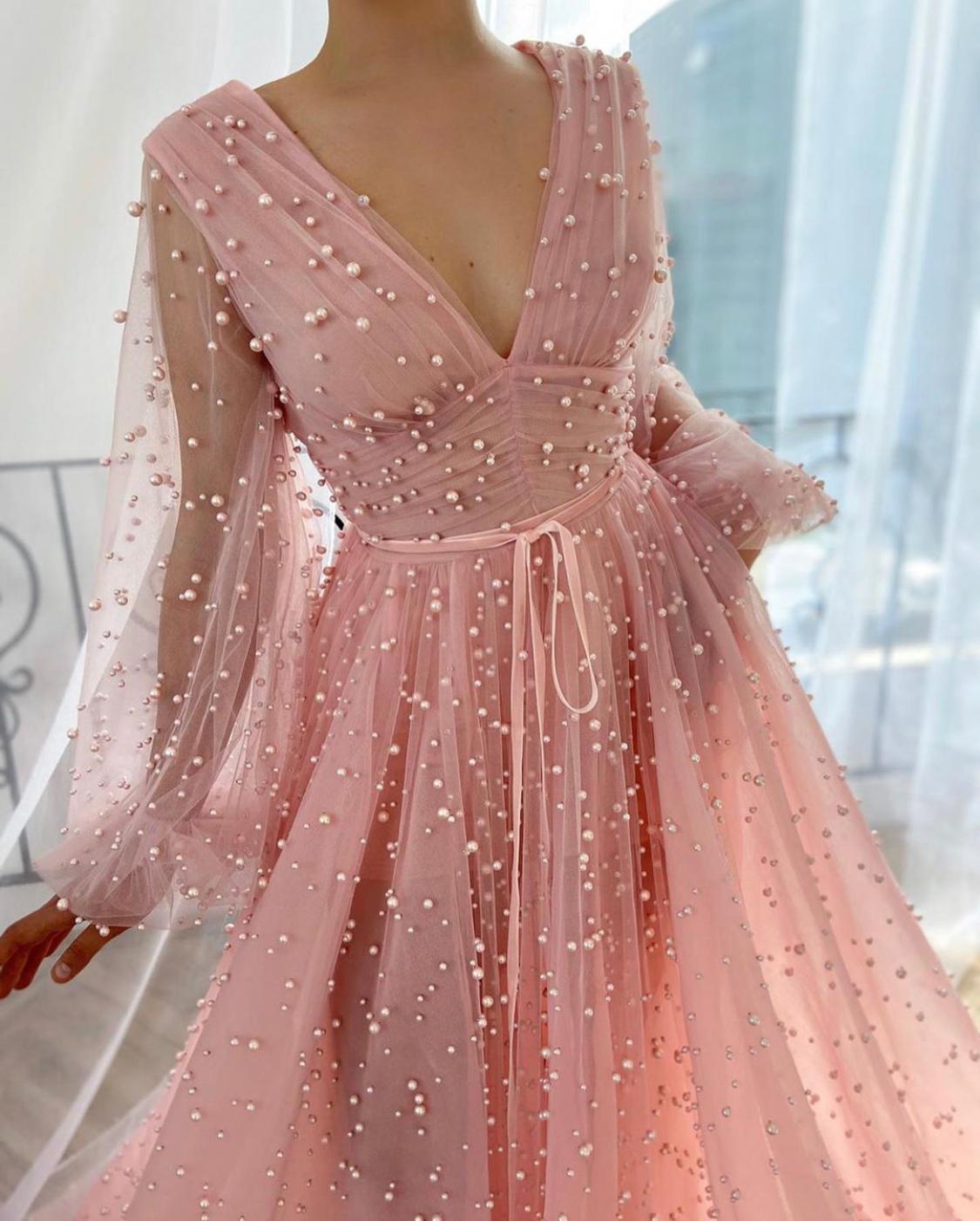 Pink A-Line dress with long sleeves, v-neck and beading