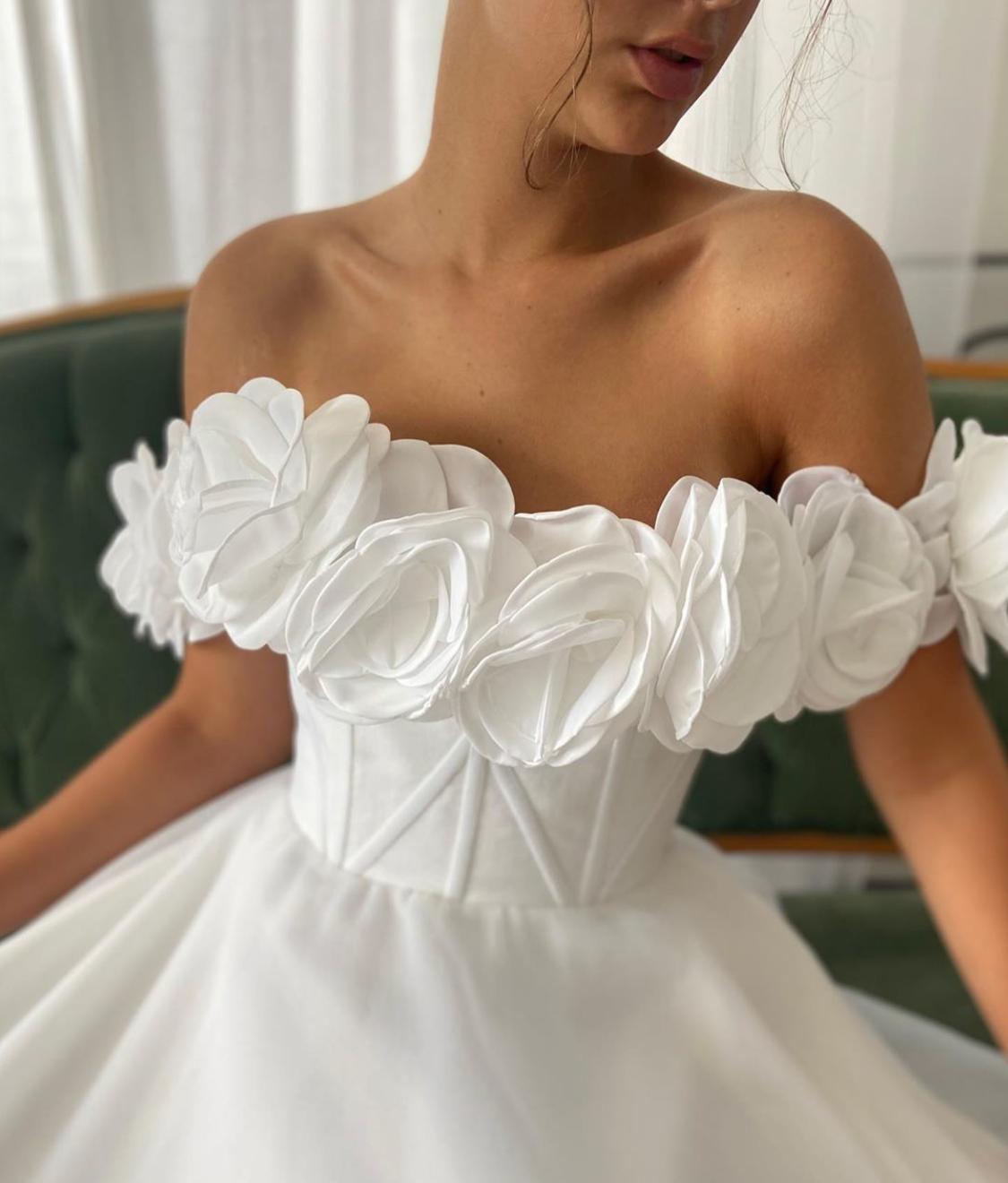 A Line white bridal dress with embroidered flowers and off shoulder sleeves