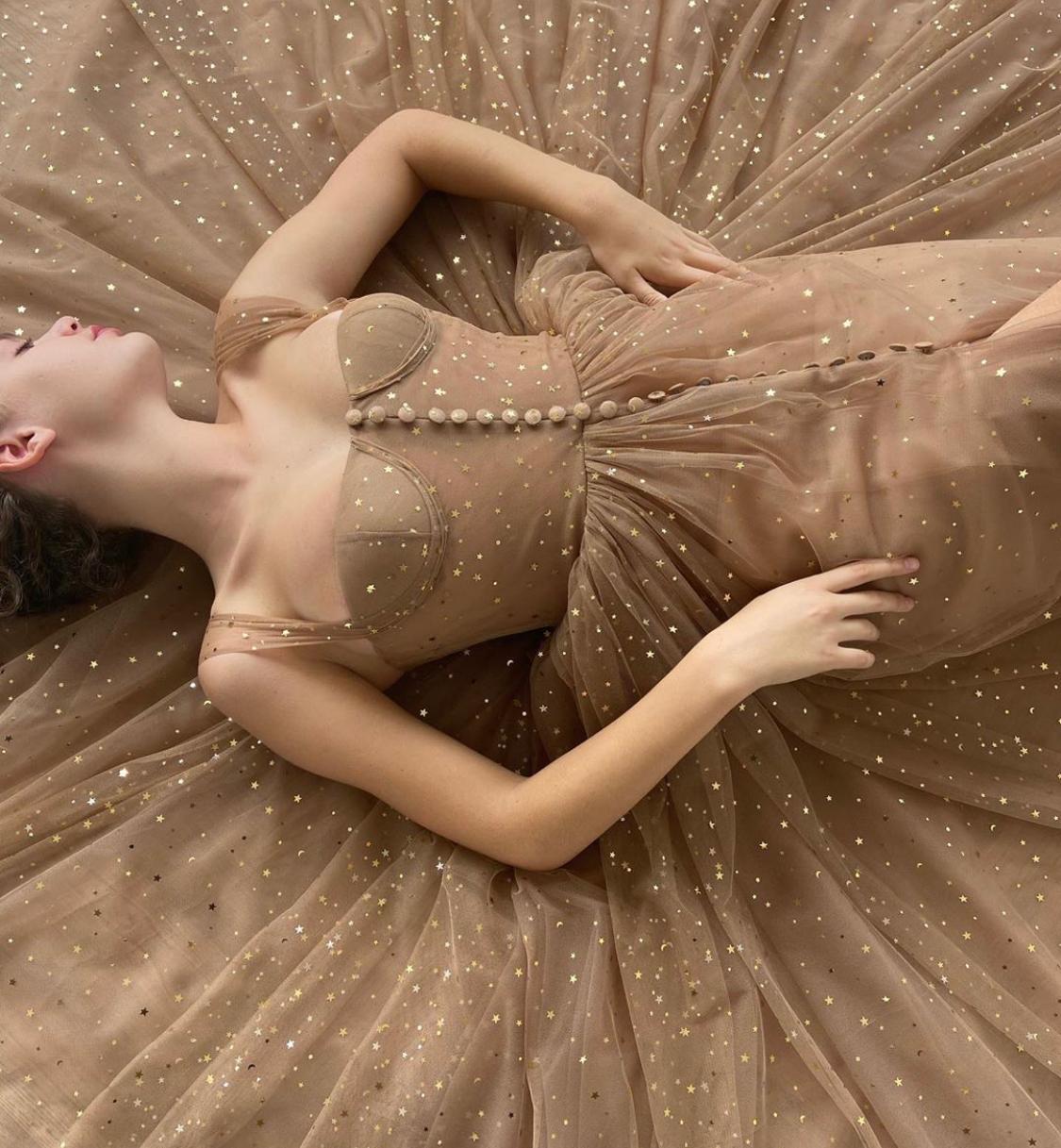 Brown midi dress with straps and starry fabric