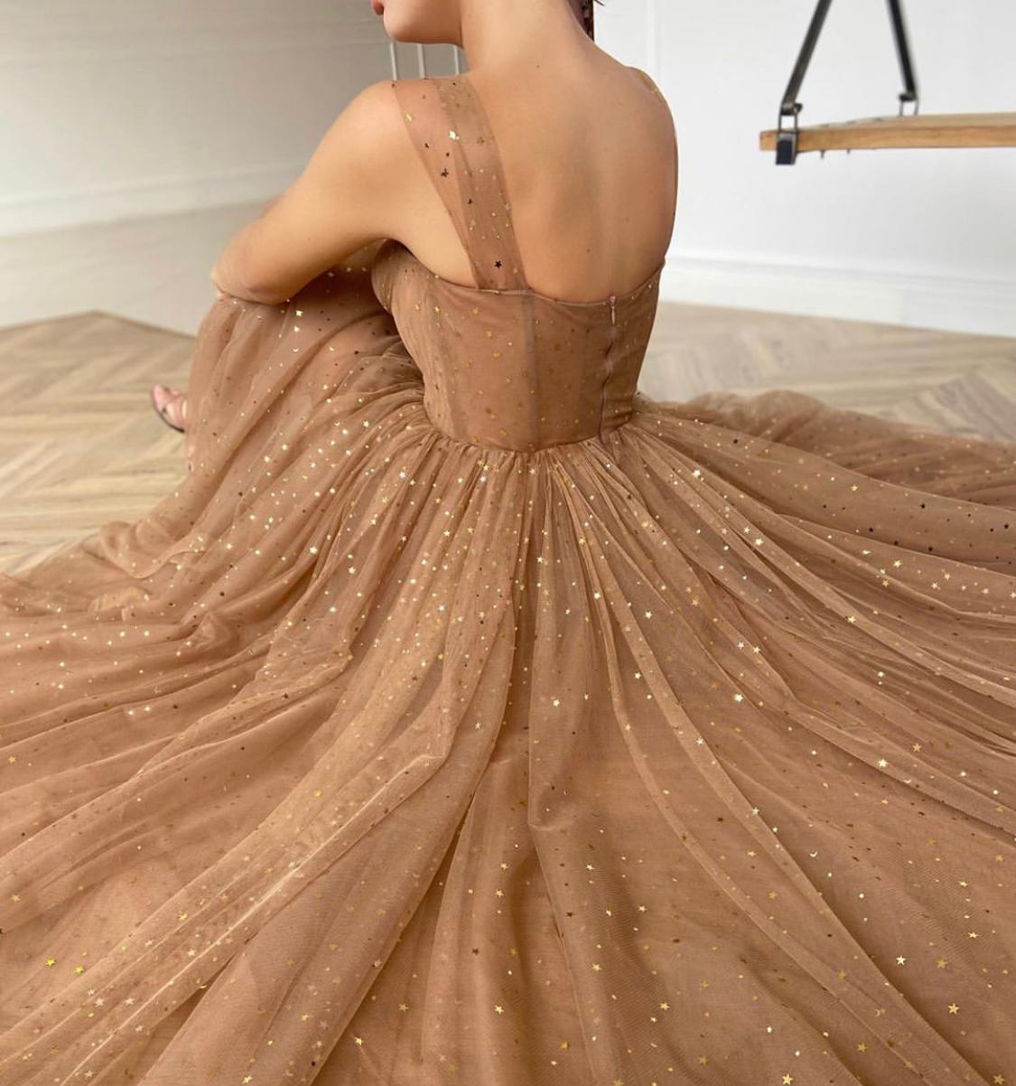 Brown midi dress with straps and starry fabric