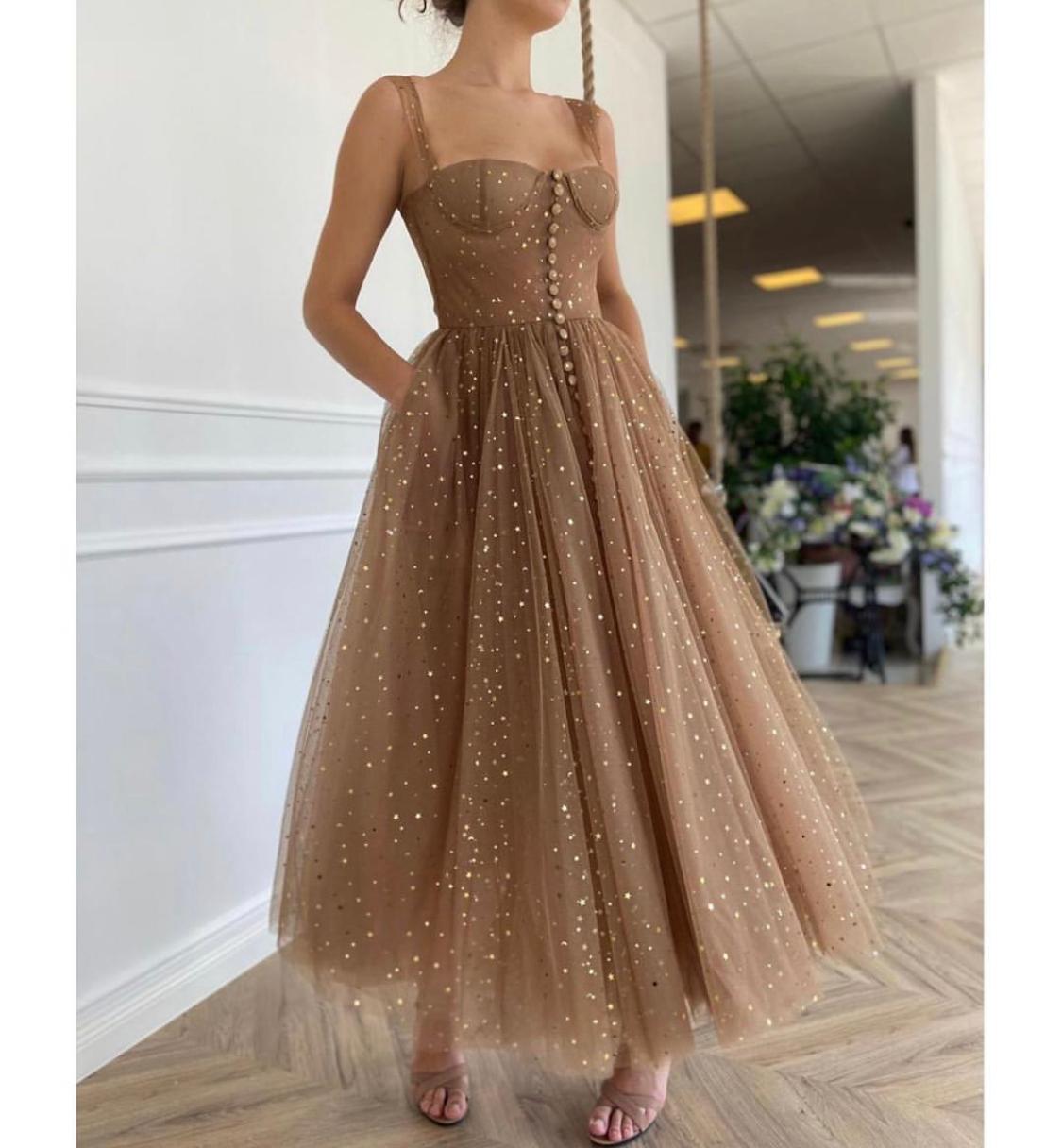Brown midi dress with straps and starry fabric